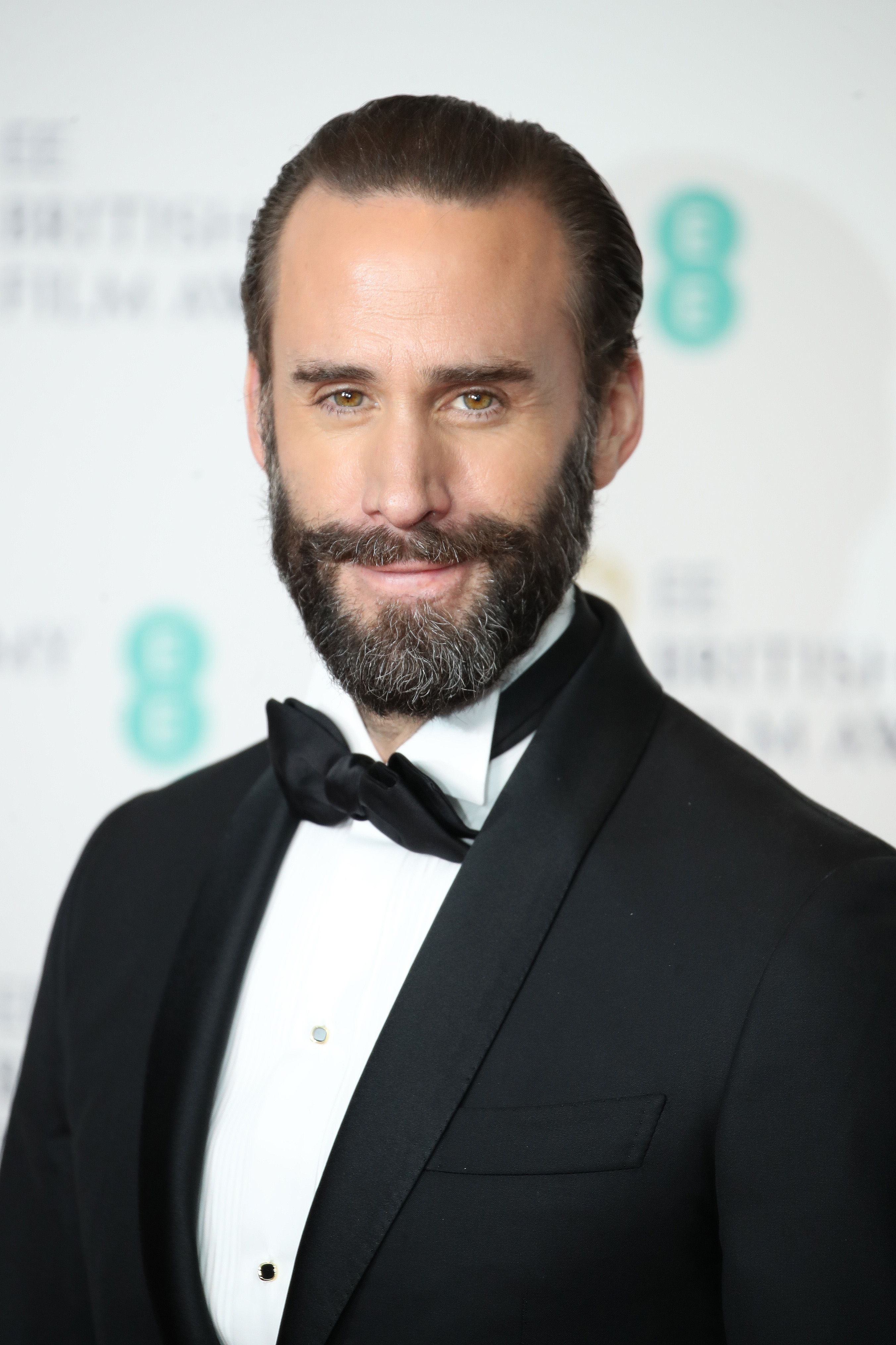 Joseph Fiennes poses in the press room during the EE British Academy Film Awards at Royal Albert Hall on February 10, 2019, in London, England | Source: Getty Images