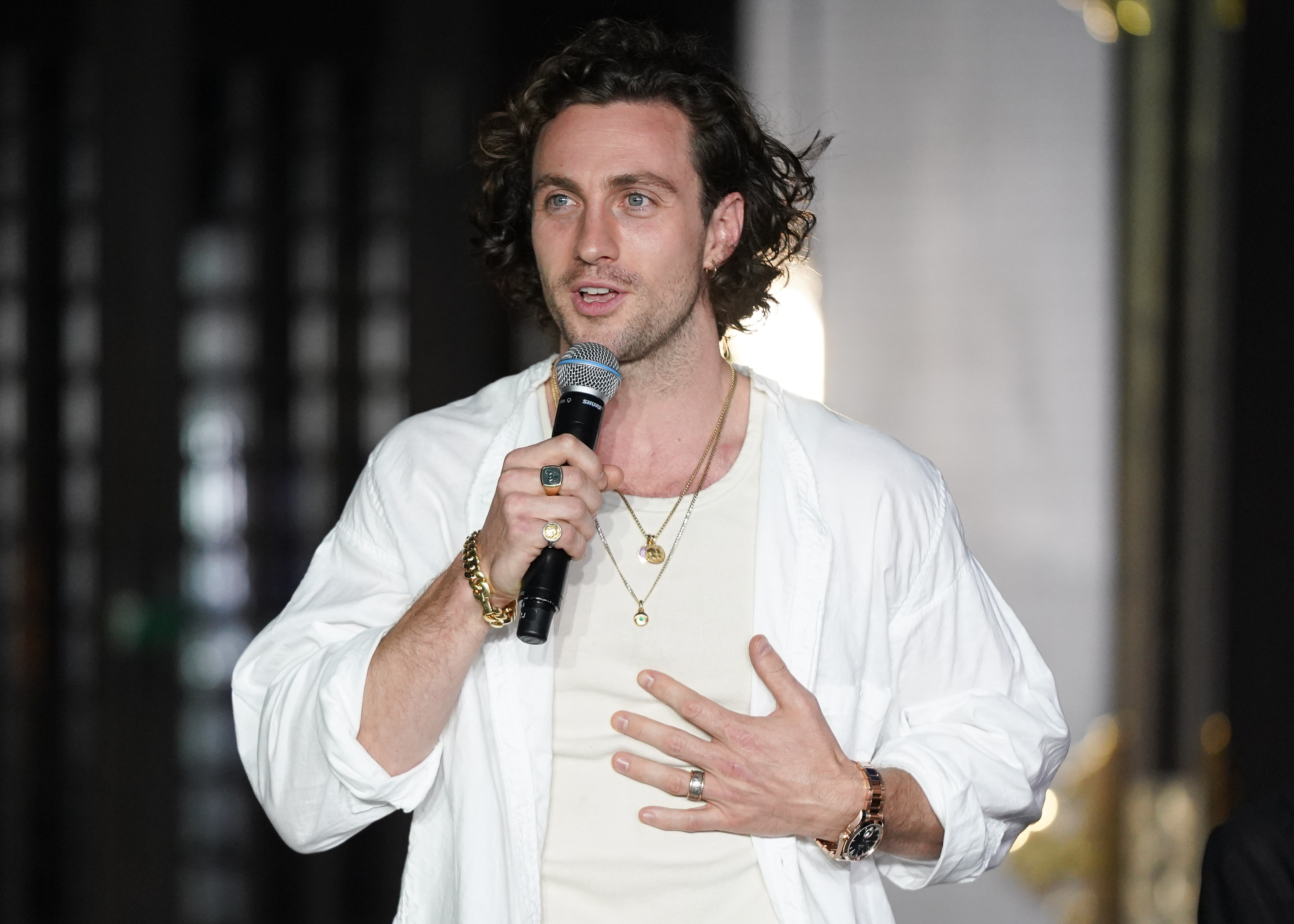 Aaron Taylor-Johnson speaking at the "Bullet Train" promotion event held at Koyasan Tokyo Betsu-In Temple in Tokyo, Japan, on August 22, 2022. | Source: Getty Images