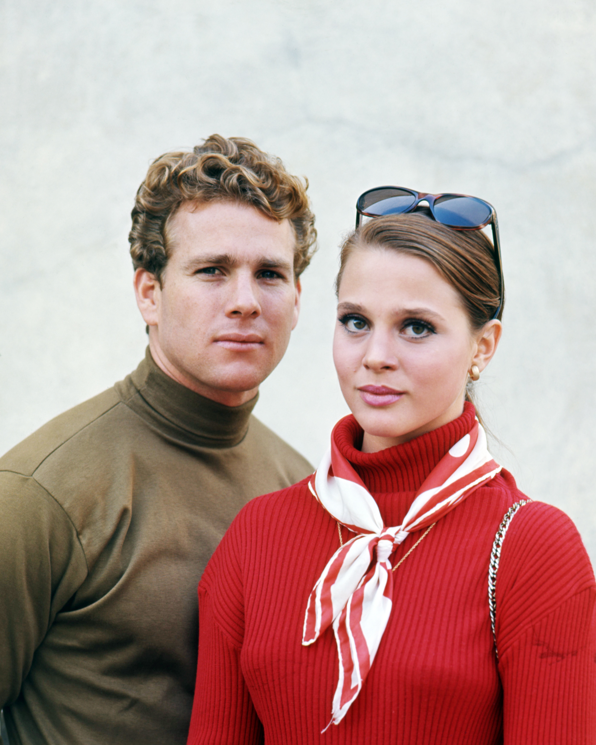 Ryan O'Neal as Rodney Harrington and Leigh Taylor-Young as Rachel Welles in "Peyton Place," circa 1966 | Source: Getty Images