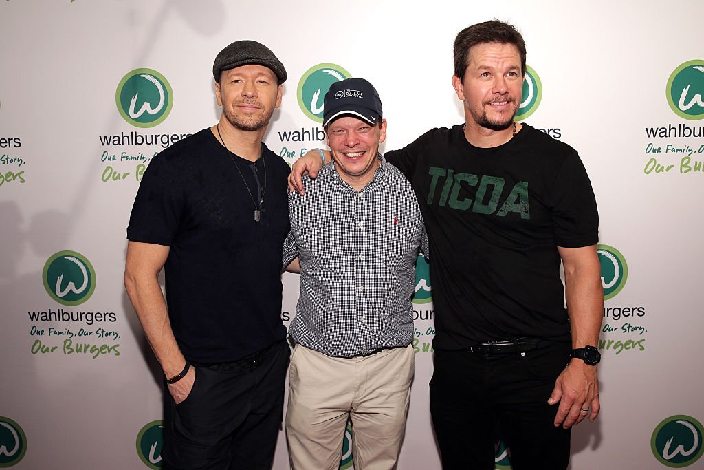 Donnie Wahlberg, Paul Wahlberg and Mark Wahlberg attend the Wahlburgers Coney Island Preview Party in Brooklyn, New York on June 23, 2015 | Photo: Getty Images