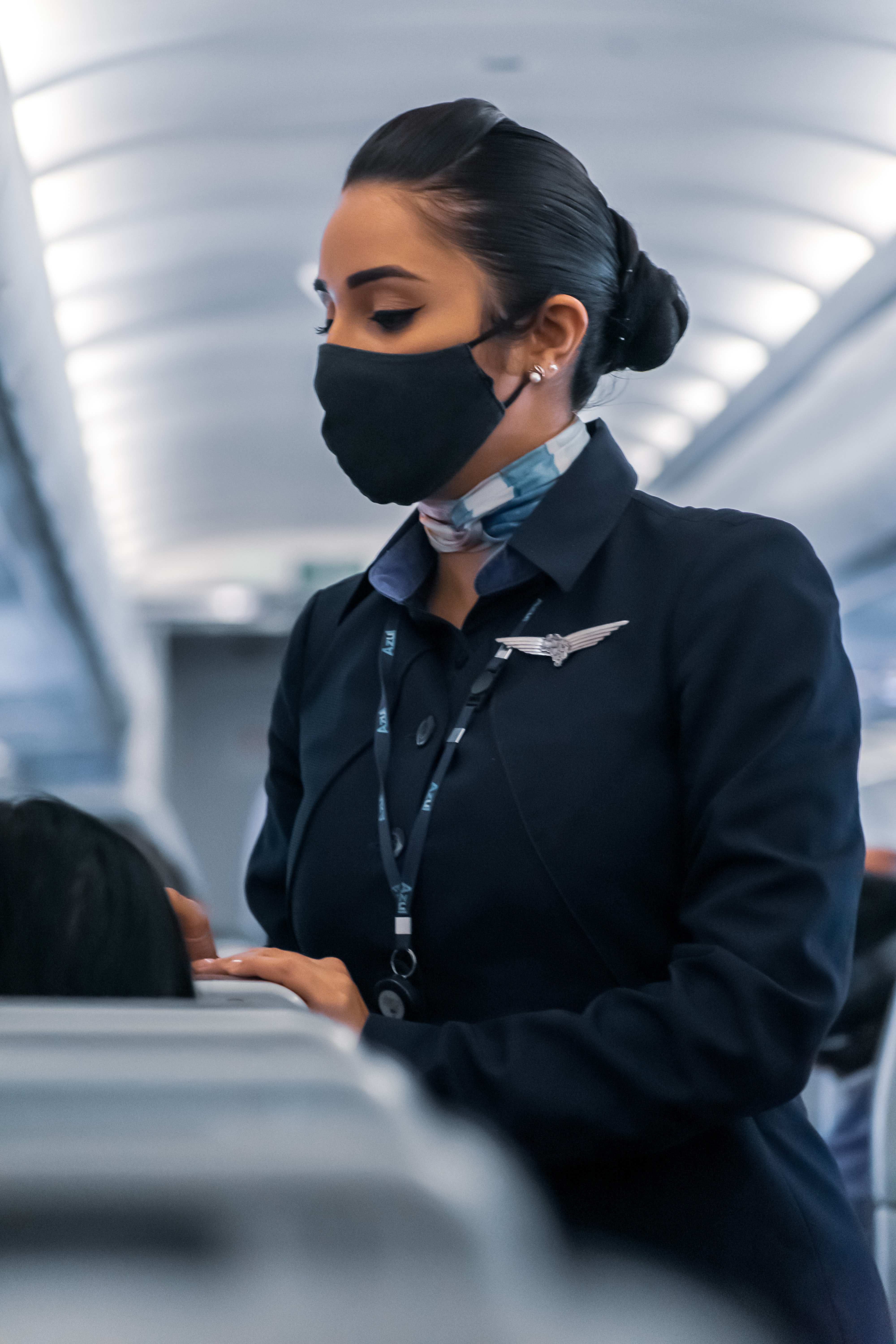 The flight attendant looked a bit mortified at the man's tone | Source: Unsplash