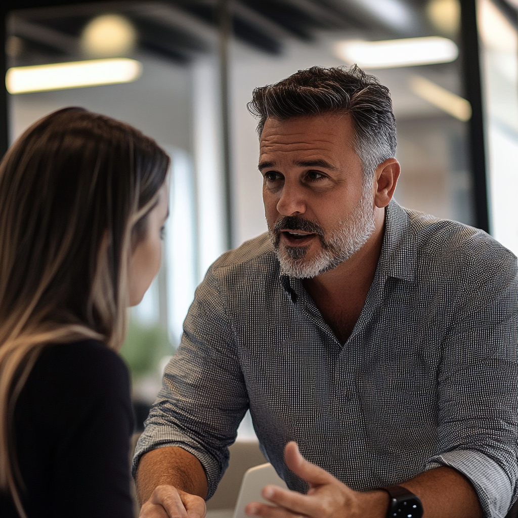 Boss having a meeting with his employee | Source: Midjourney