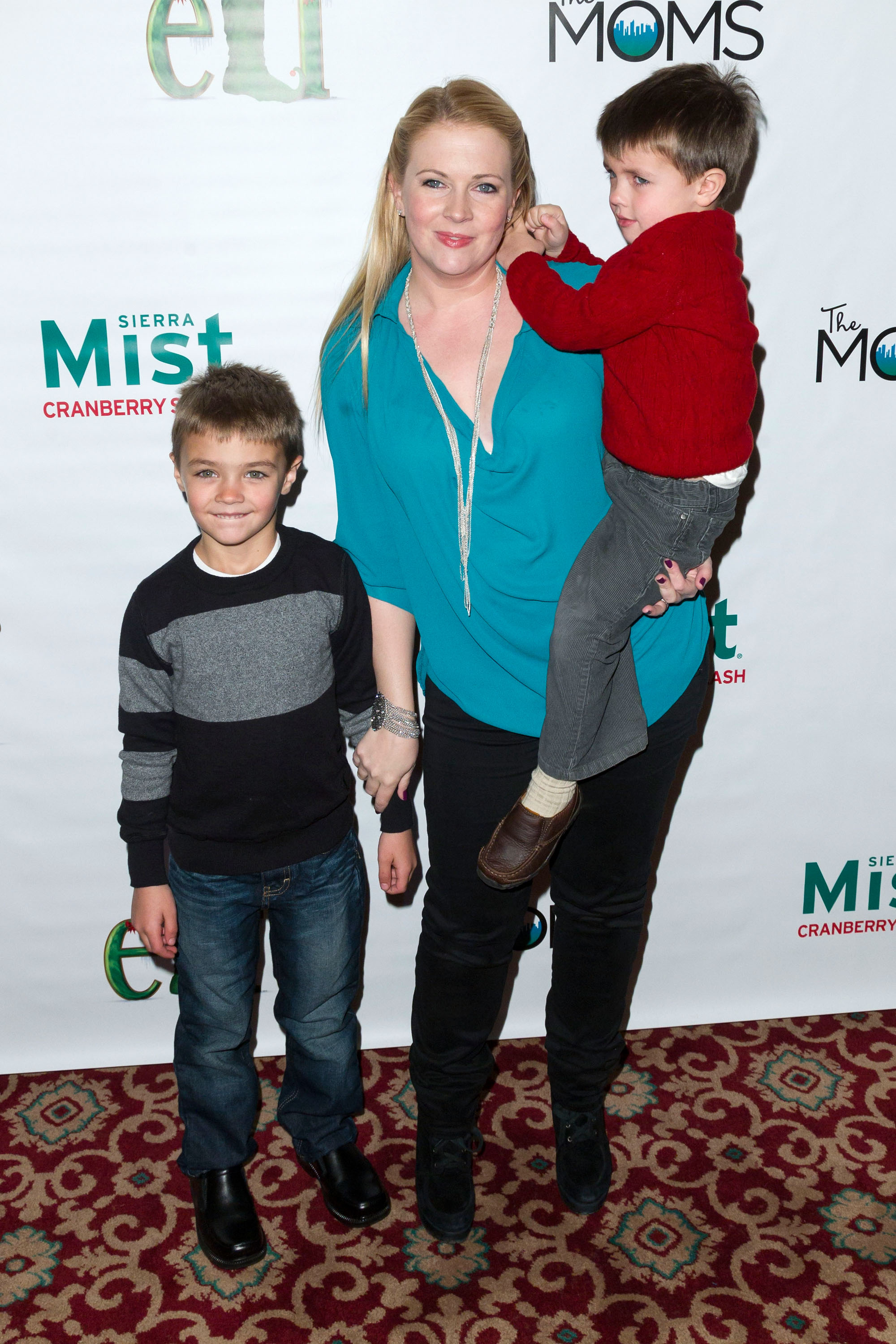 Mason, Melissa Joan Hart, and Braydon attend "Elf The Musical" Holiday Christmas Party Hosted By The Moms in New York City, on November 13, 2012. | Source: Getty Images