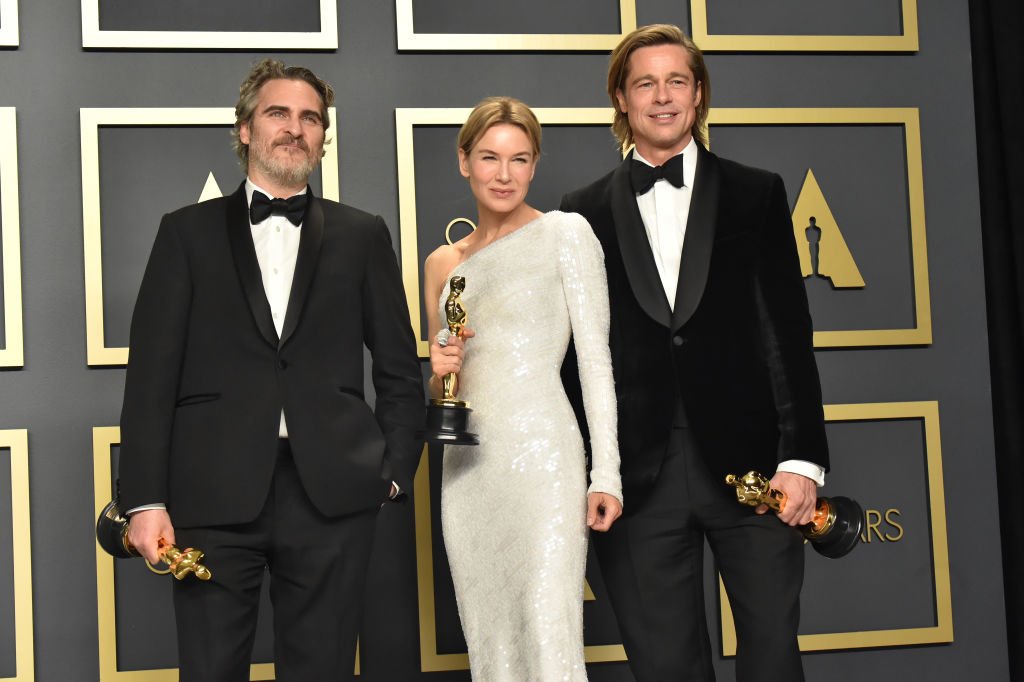 Joaquin Phoenix, Renée Zellweger, and Brad Pitt pose in the press room during the 92nd Annual Academy Awards at Hollywood and Highland on February 09, 2020. | Source: Getty Images