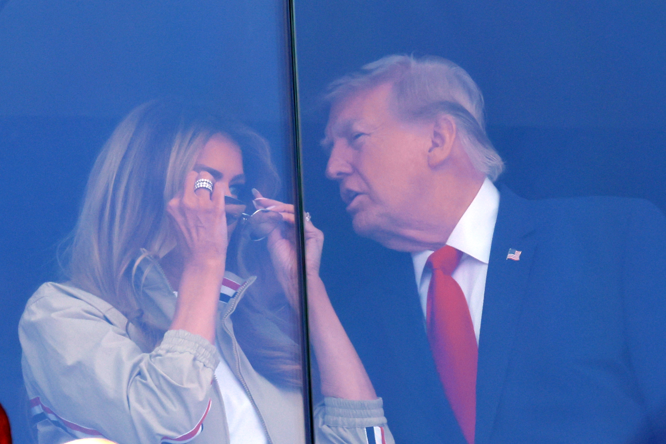 Her sporty, understated ensemble marked a sharp contrast with the formality surrounding the presidential suite. Even so, the mirrored lenses ensured that the look felt anything but low-key. | Source: Getty Images
