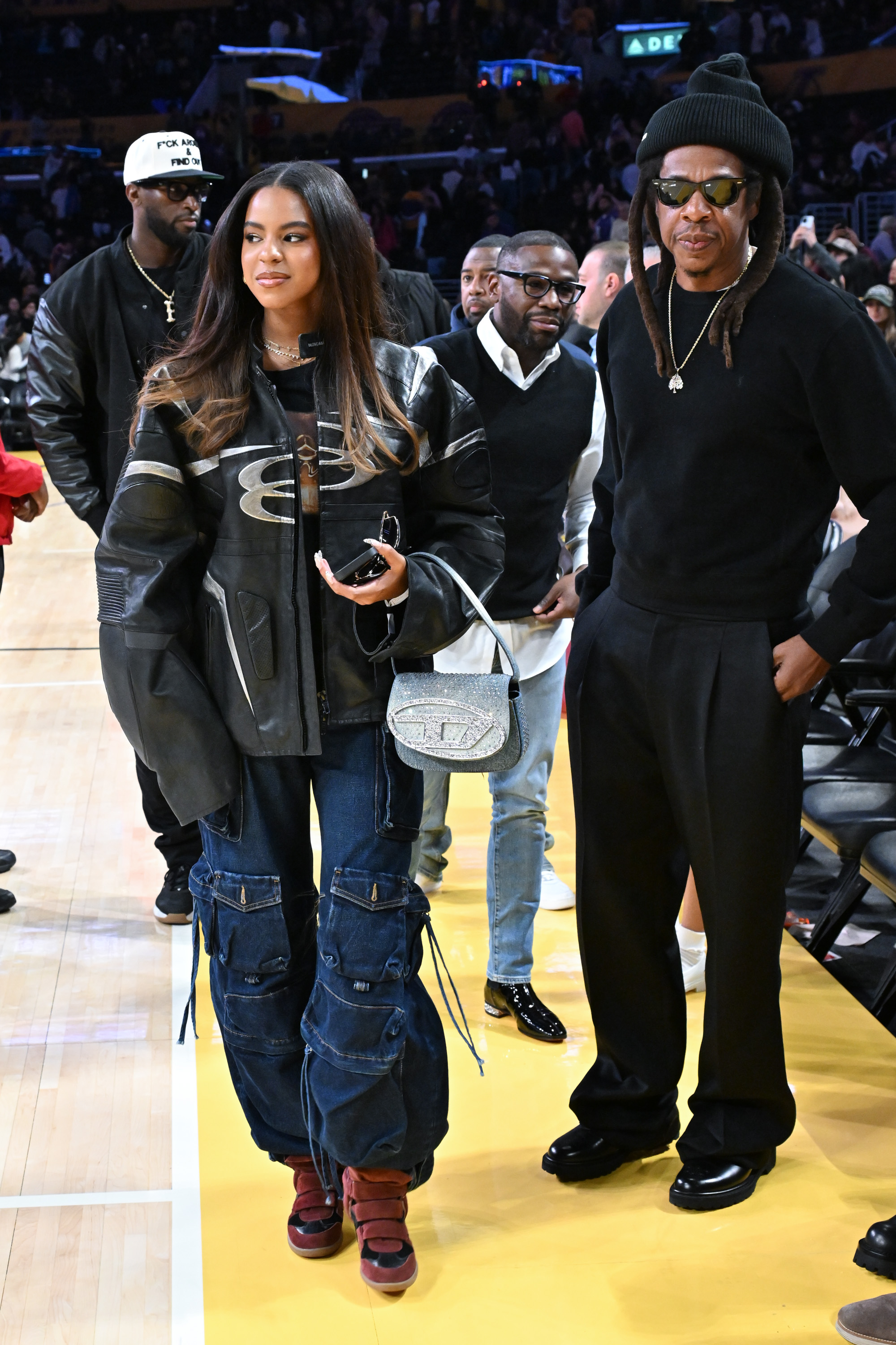 Blue Ivy Carter, with her full face of makeup and silk-pressed hair, looks like she has really blossomed and now bears a striking resemblance to her mom, Beyoncé, in her expressions and features. She has that same fierce eyes as her mother.