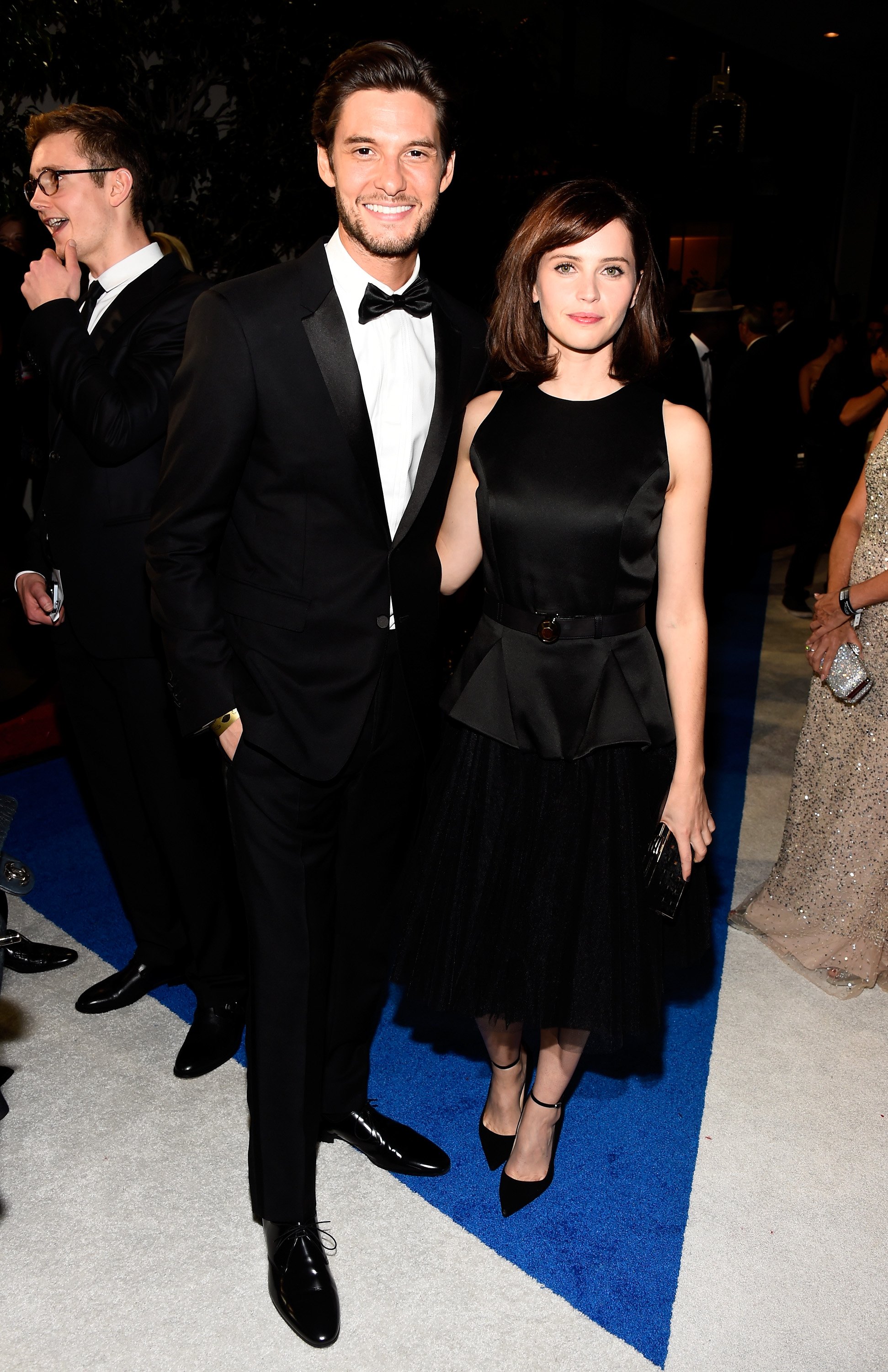 Ben Barnes and Felicity Jones pose while being photographed at the BAFTA Los Angeles Jaguar Britannia Awards in Beverly Hills | Source: Getty Images