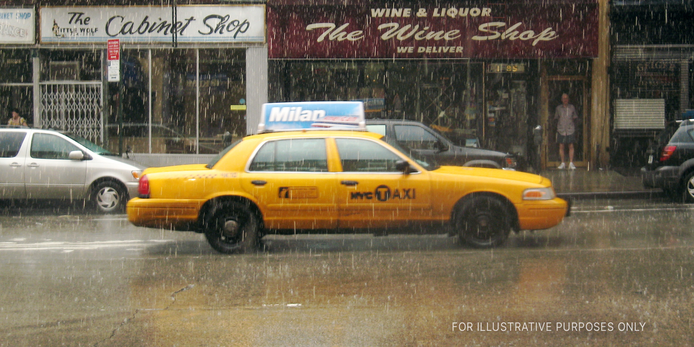 Yellow taxi cab driving on a city street during hard rainfall | Source: Flickr/wka (CC BY-SA 2.0)