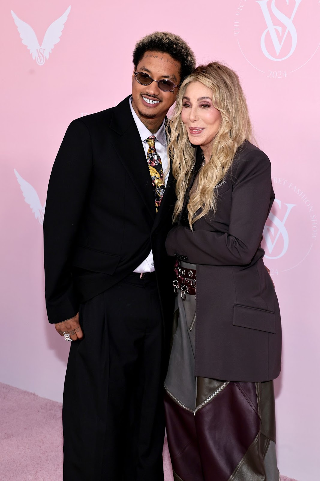 Alexander "AE" Edwards and Cher at the Victoria's Secret 2024 Fashion Show on October 15 in Brooklyn, New York. | Source: Getty Images