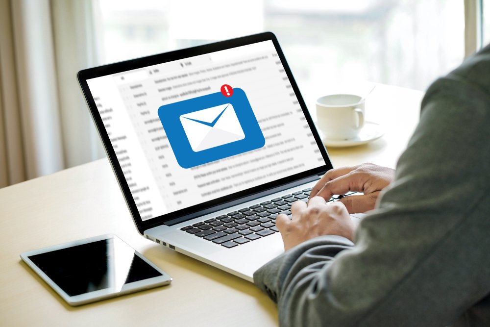 A photo of a man trying to send an email | Photo: Shutterstock