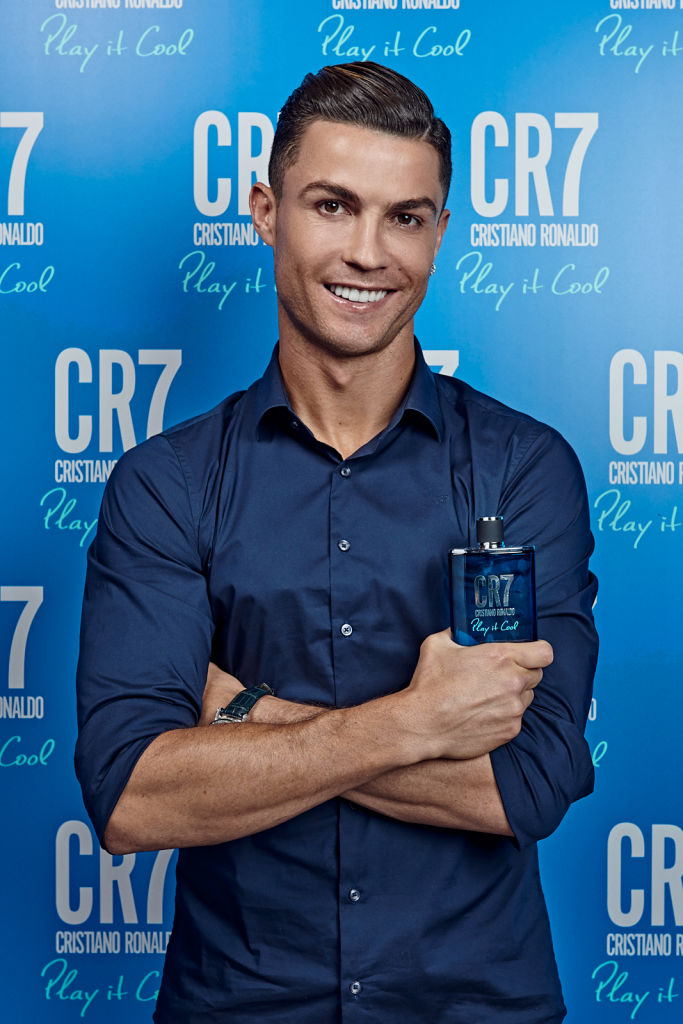Cristiano Ronaldo celebrates the launch of new CR7 Play It Cool on September 12, 2019, in Turin, Italy. | Source: Getty Images