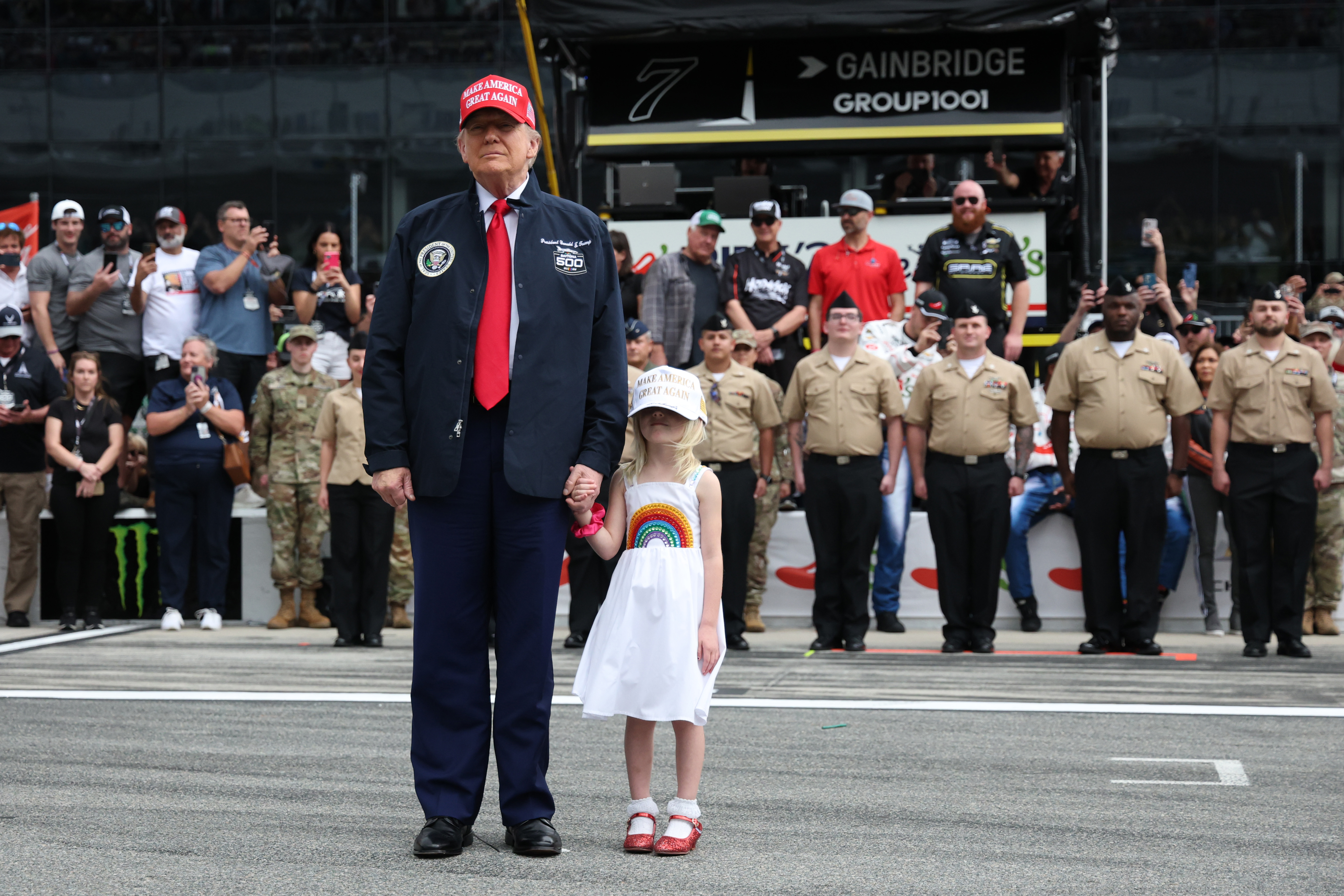 U.S. President Donald Trump and his granddaughter Carolina are seen prior to the NASCAR Cup Series Daytona 500 at Daytona International Speedway on February 16, 2025 in Daytona Beach, Florida | Source: Getty Images