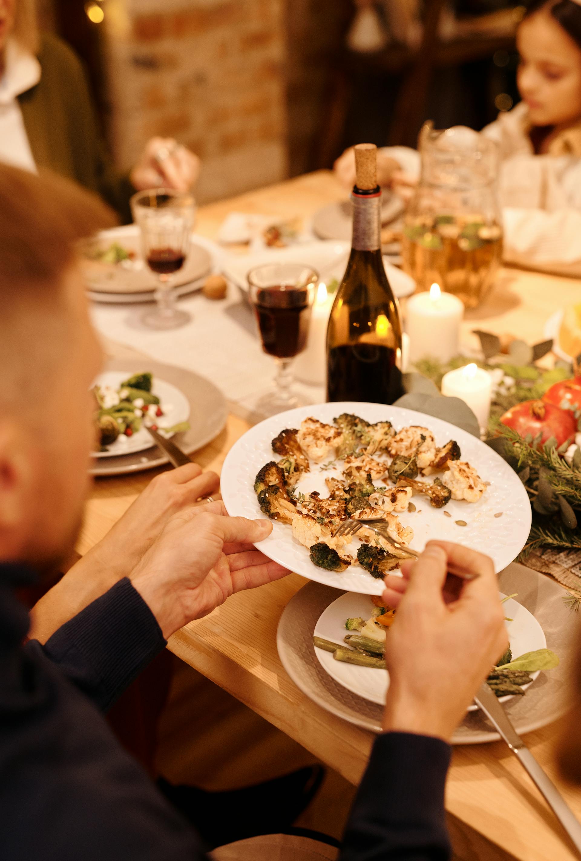 Man busy eating his dinner | Source: Pexels