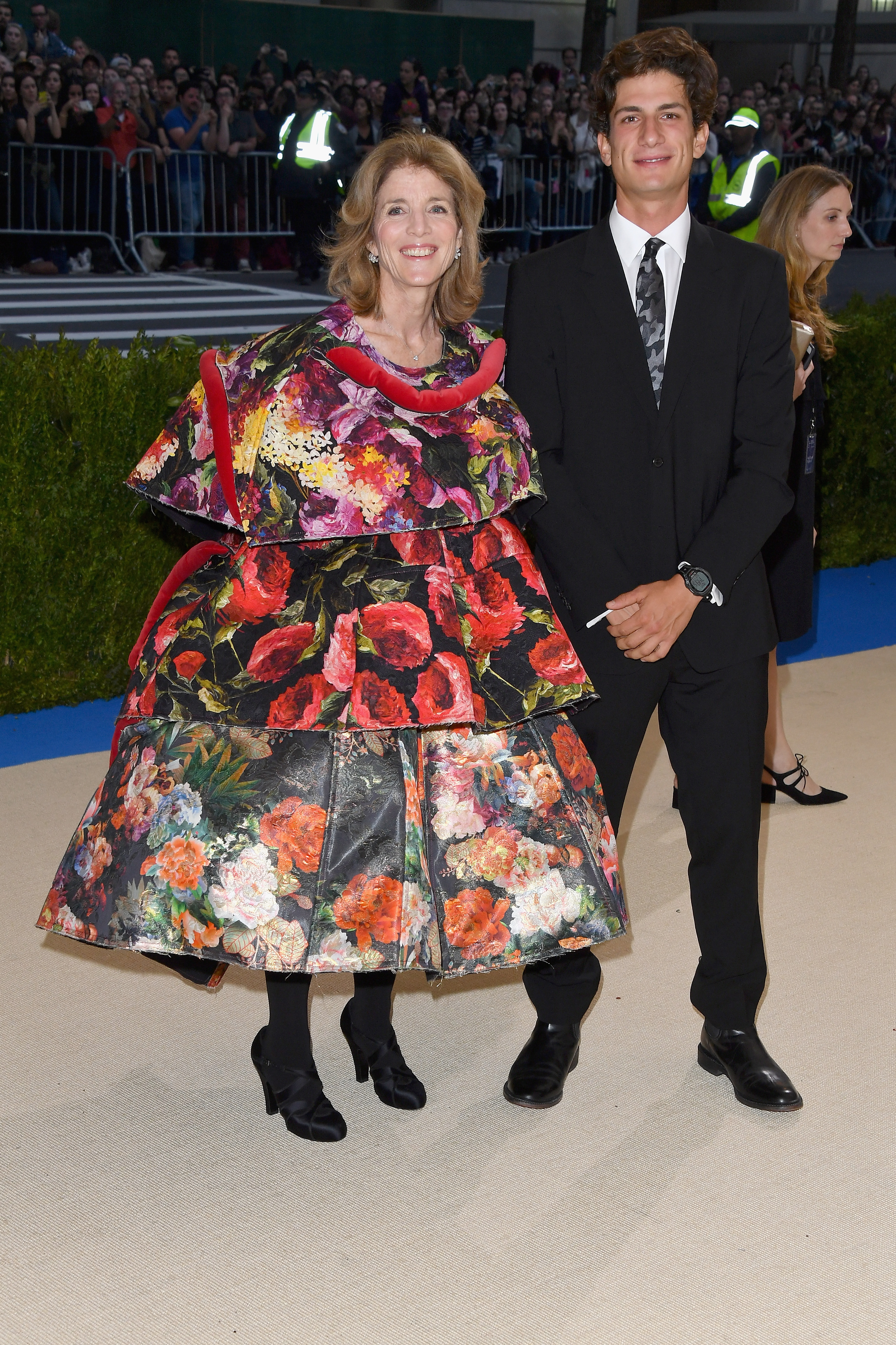Caroline Kennedy paired her spherical, floral gown with black booties while her son, Jack Schlossberg, kept things simple in a black suit at the Met Gala with the theme: Rei Kawakubo/Comme des Garcons: Art Of The In-Between" on May 1, 2017, in New York City.