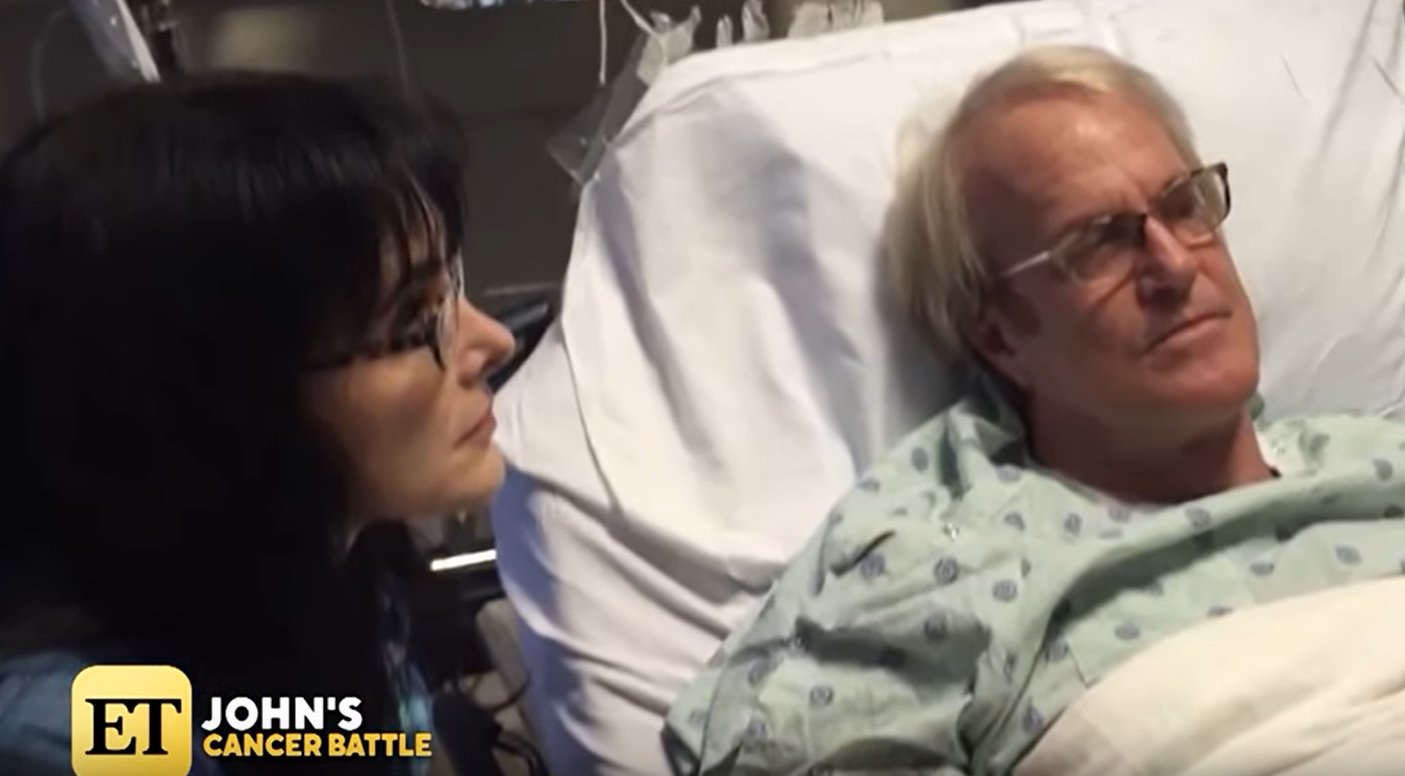 John Tesh in the hospital in throwback photo shared on Entertainment Tonight with Mary Hart | Photo: YouTube/ Entertainment Tonight