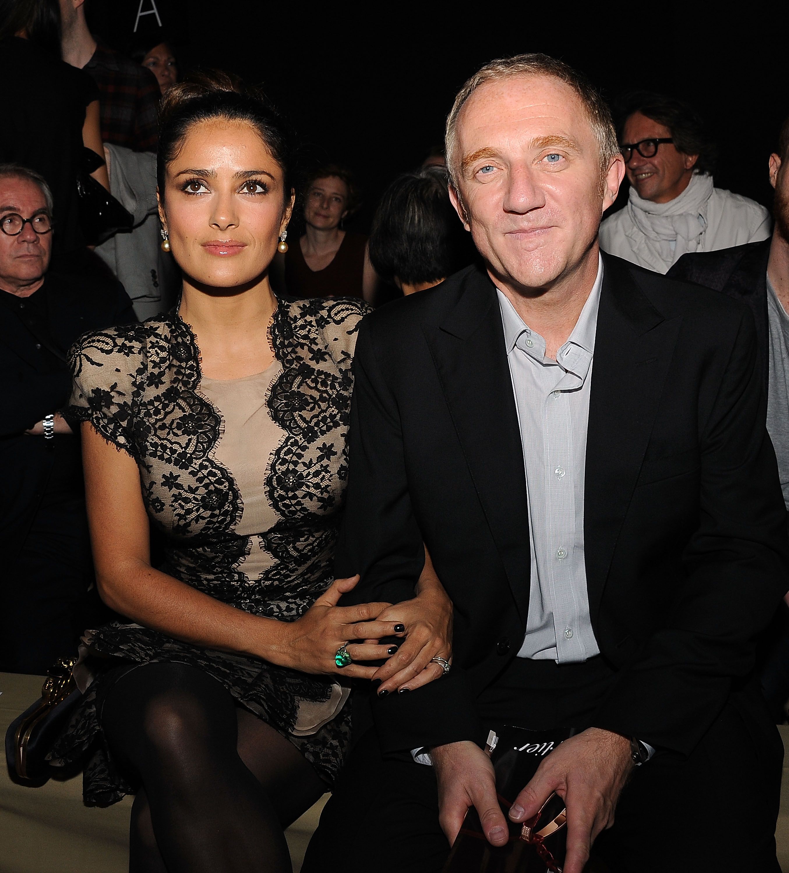Salma Hayek and Francois-Henri Pinault during the Alexander McQueen Ready to Wear Spring/Summer show during Paris Fashion Week on October 5, 2010, in France. | Source: Getty Images