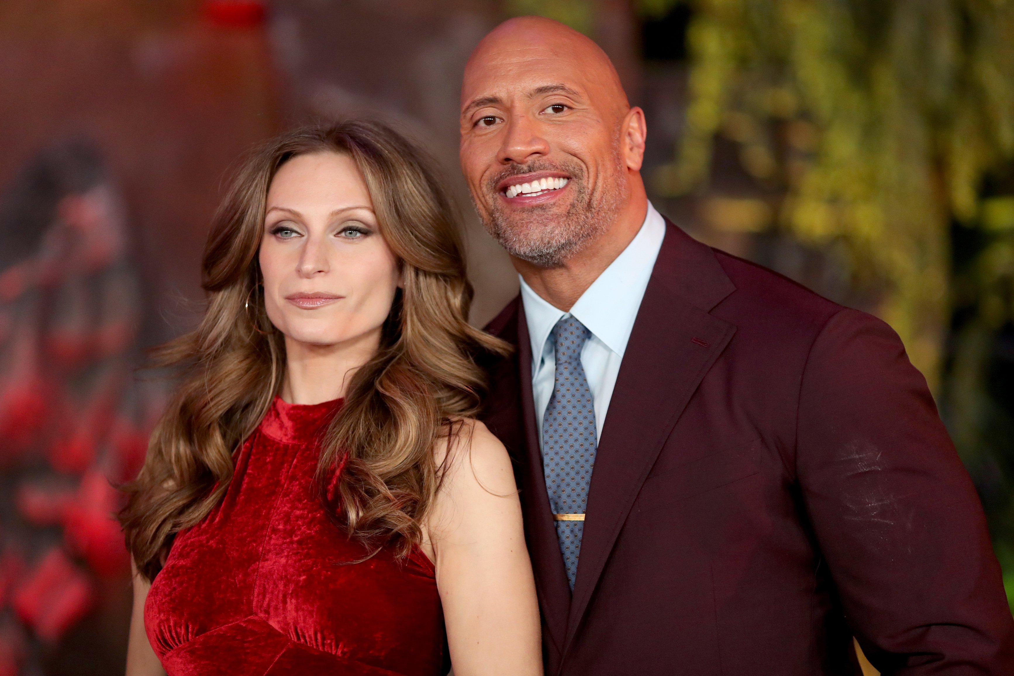 Lauren Hashian and Dwayne Johnson attend the premiere of Columbia Pictures' "Jumanji: Welcome To The Jungle" on December 11, 2017, in Hollywood, California. | Source: Getty Images.
