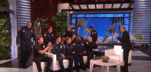 Ellen DeGeneres welcomes ten California firefighters on stage in tribute to their service. | Source: YouTube/TheEllenShow.