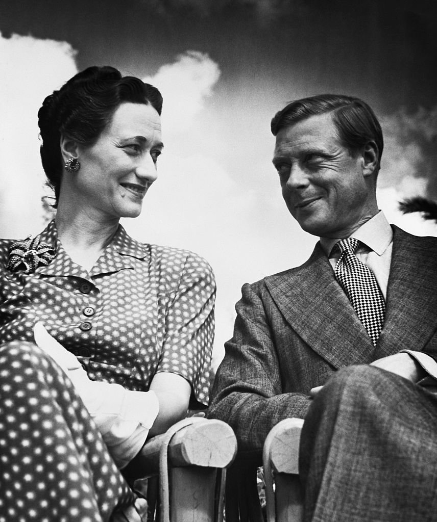 The Duke and Duchess of Windsor seated under an open sky. | Source: Getty Images