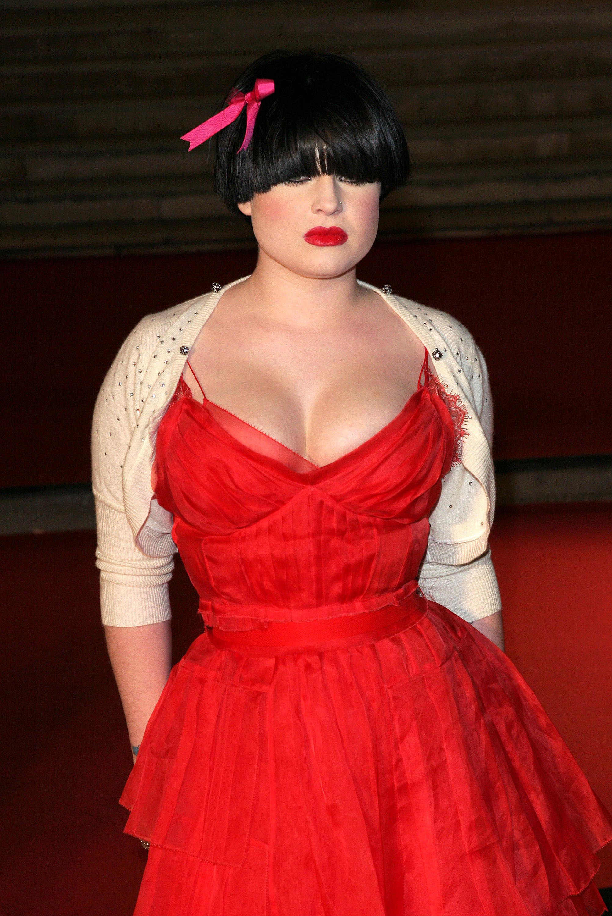 As she became famous on her own right, she started experimenting with different styles and her body matured as she aged. For this specific event, she arrived at the 25th Brit Awards at Earls Court 2 on February 9, 2005, in London, Great Britain.