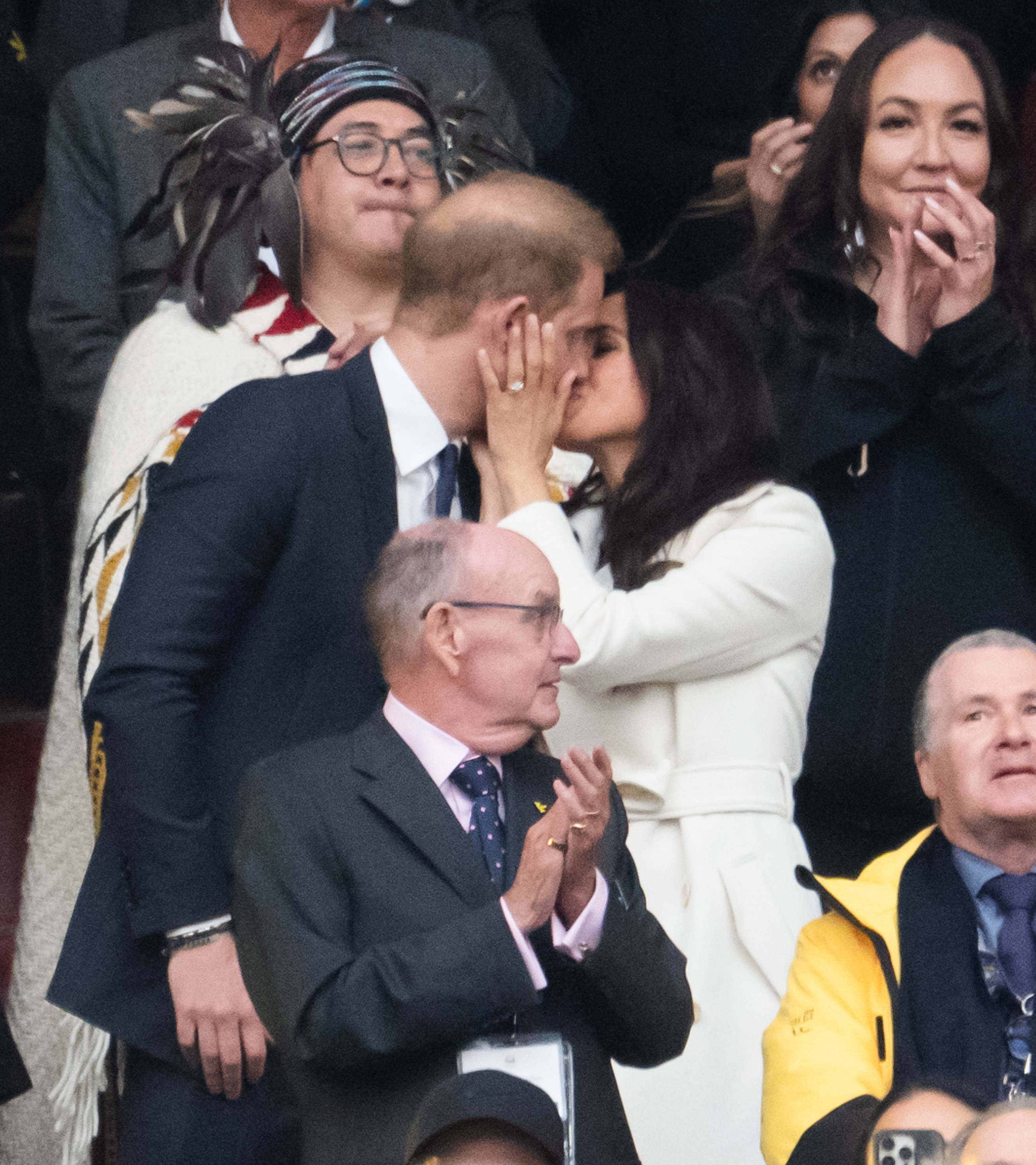 Prince Harry, Duke of Sussex, and Meghan, Duchess of Sussex, kiss during the opening ceremony of the 2025 Invictus Games at BC Place on February 8, 2025, in Vancouver, British Columbia, Canada | Source: Getty Images