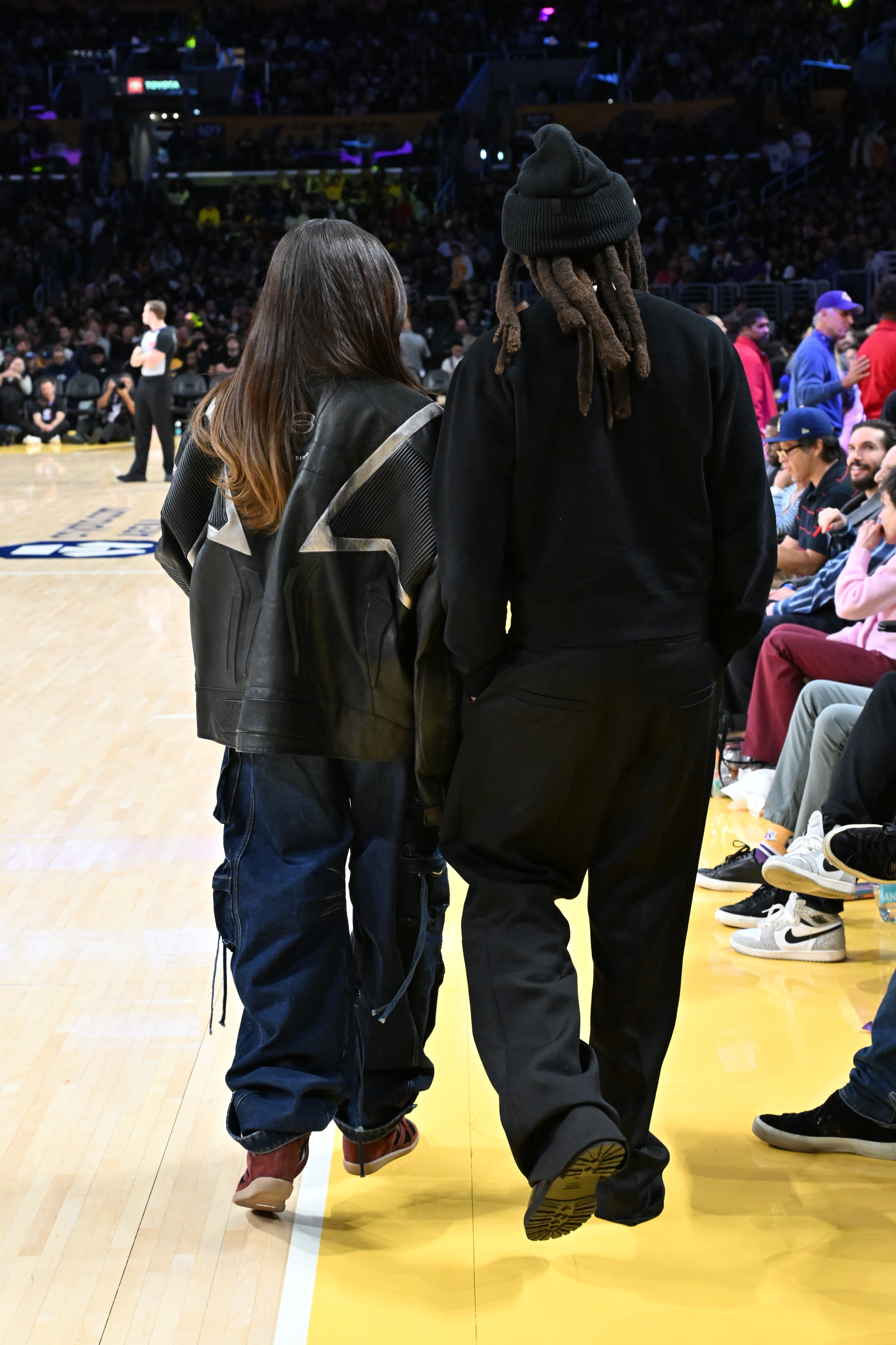 Blue Ivy Carter and Jay-Z attend a basketball game between the Los Angeles Lakers and San Antonio Spurs at Crypto.com Arena in Los Angeles, California, on December 10, 2025 | Source: Getty Images