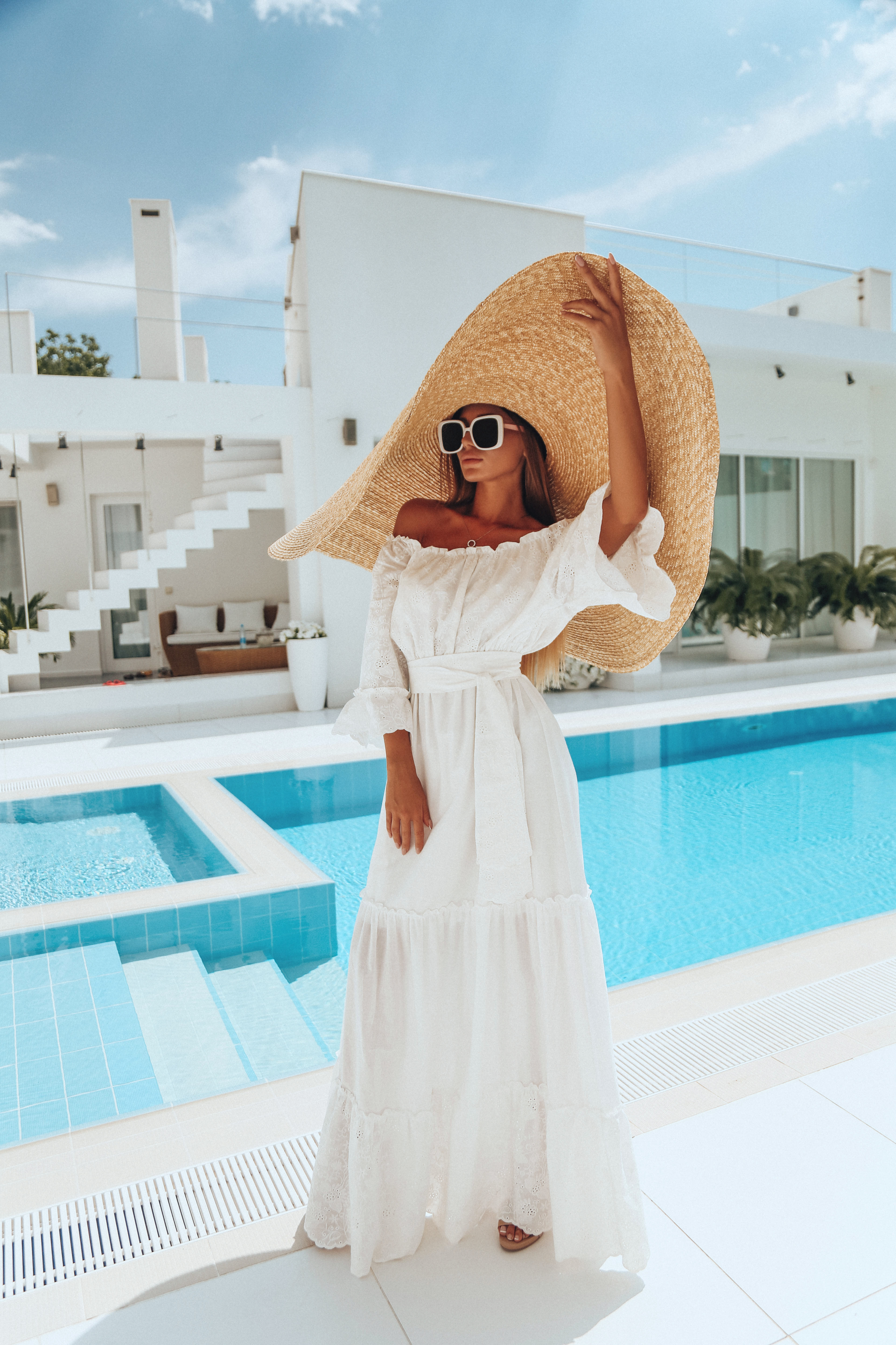 A woman photographed by the pool | Source: Getty Images