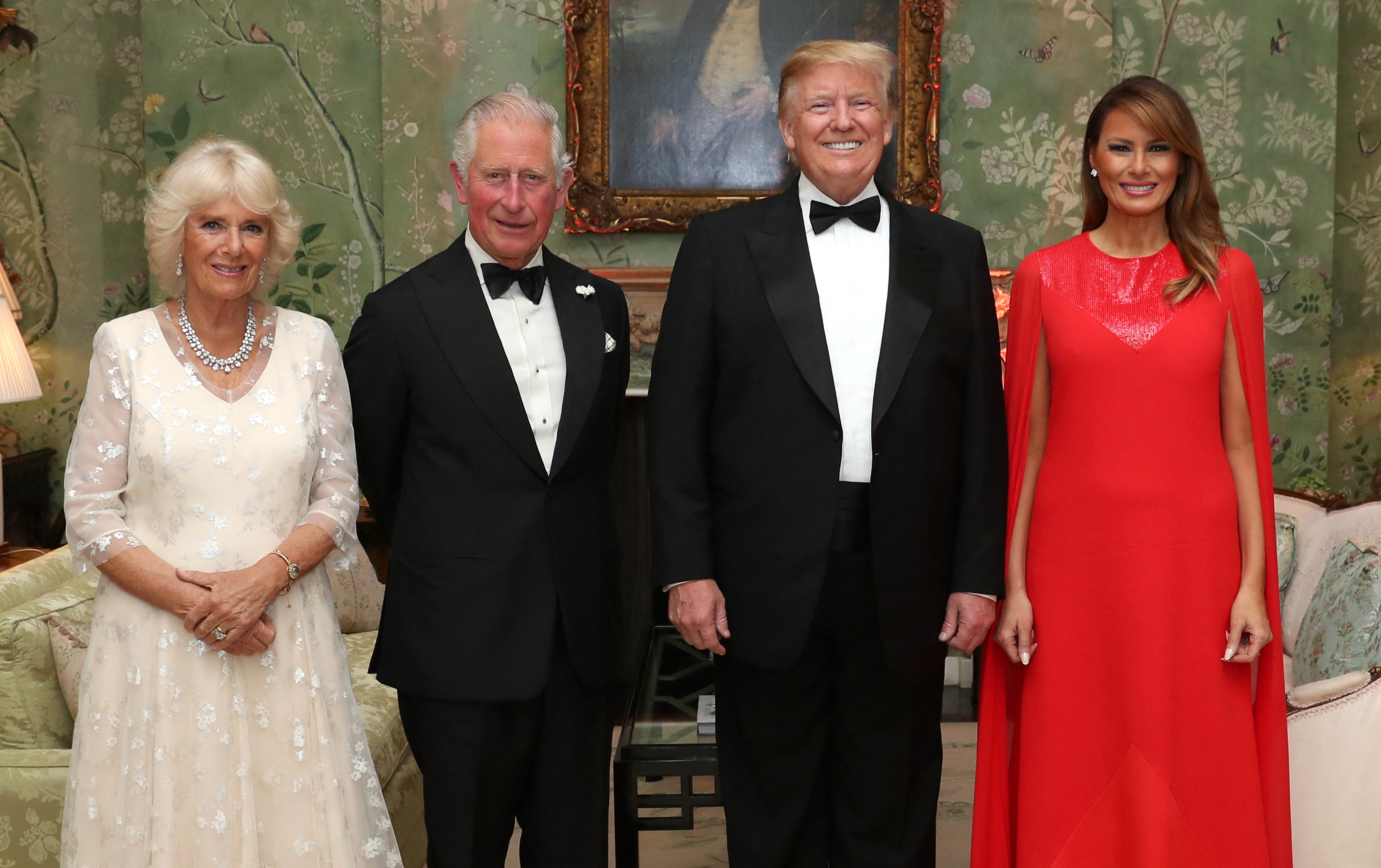 Britain's King Charles and Queen Camilla, pose for a photograph with US President Donald Trump and his wife Melania, ahead of a dinner at Winfield House on June 4, 2019 | Source: Getty Images