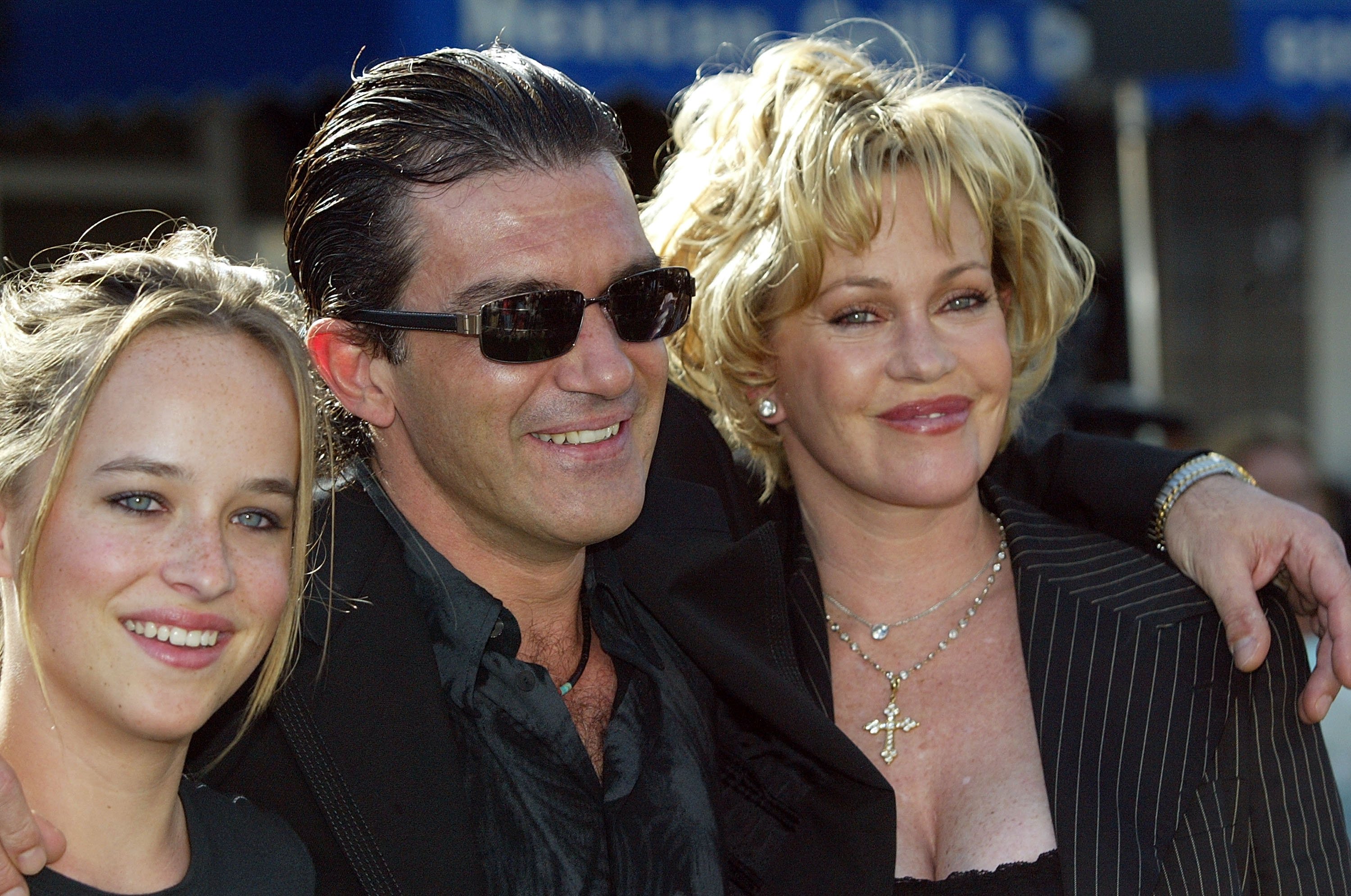 Actors Antonio Banderas and Melanie Griffith with daughter Dakota Johnson at the Los Angeles premiere of the Dreamworks Pictures' film "Shrek 2" at the Mann Village Theatre May 8, 2004 in Westwood, California. | Source: Getty Images