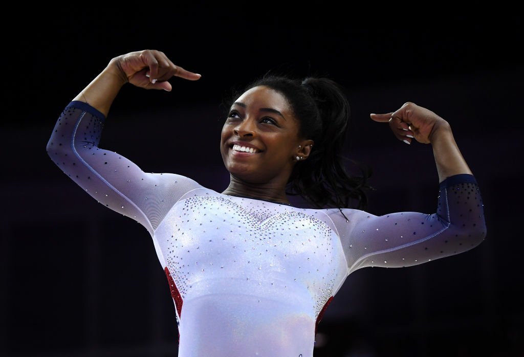 Simone Biles of the USA reacts after finishing her her performance on balance beam during the Superstars of Gymnastics at The O2 Arena | Photo: Getty Images