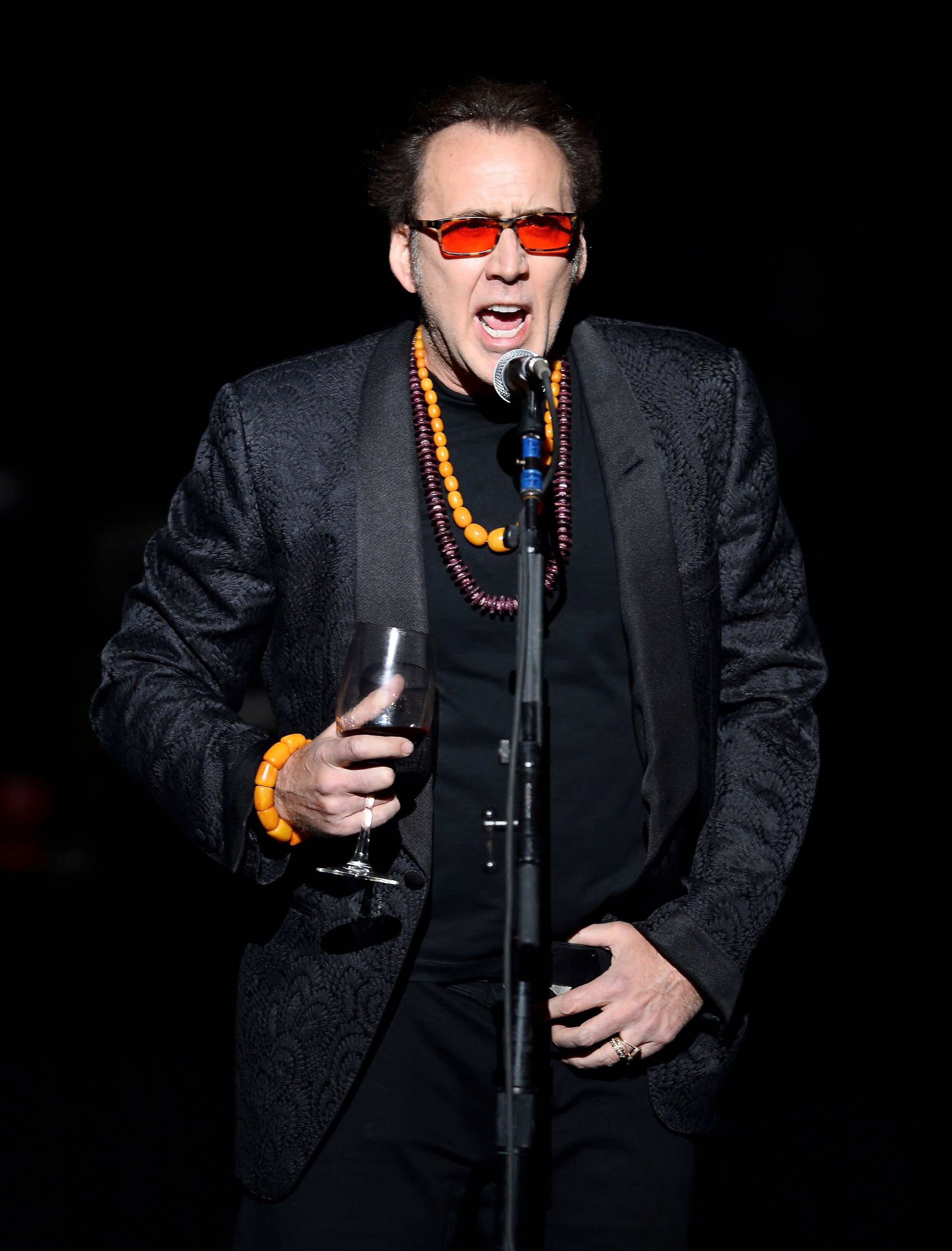 Nicolas Cage introduces Guns N' Roses at The Joint inside the Hard Rock Hotel & Casino during the opening night of the band's second residency. | Source: Getty Images