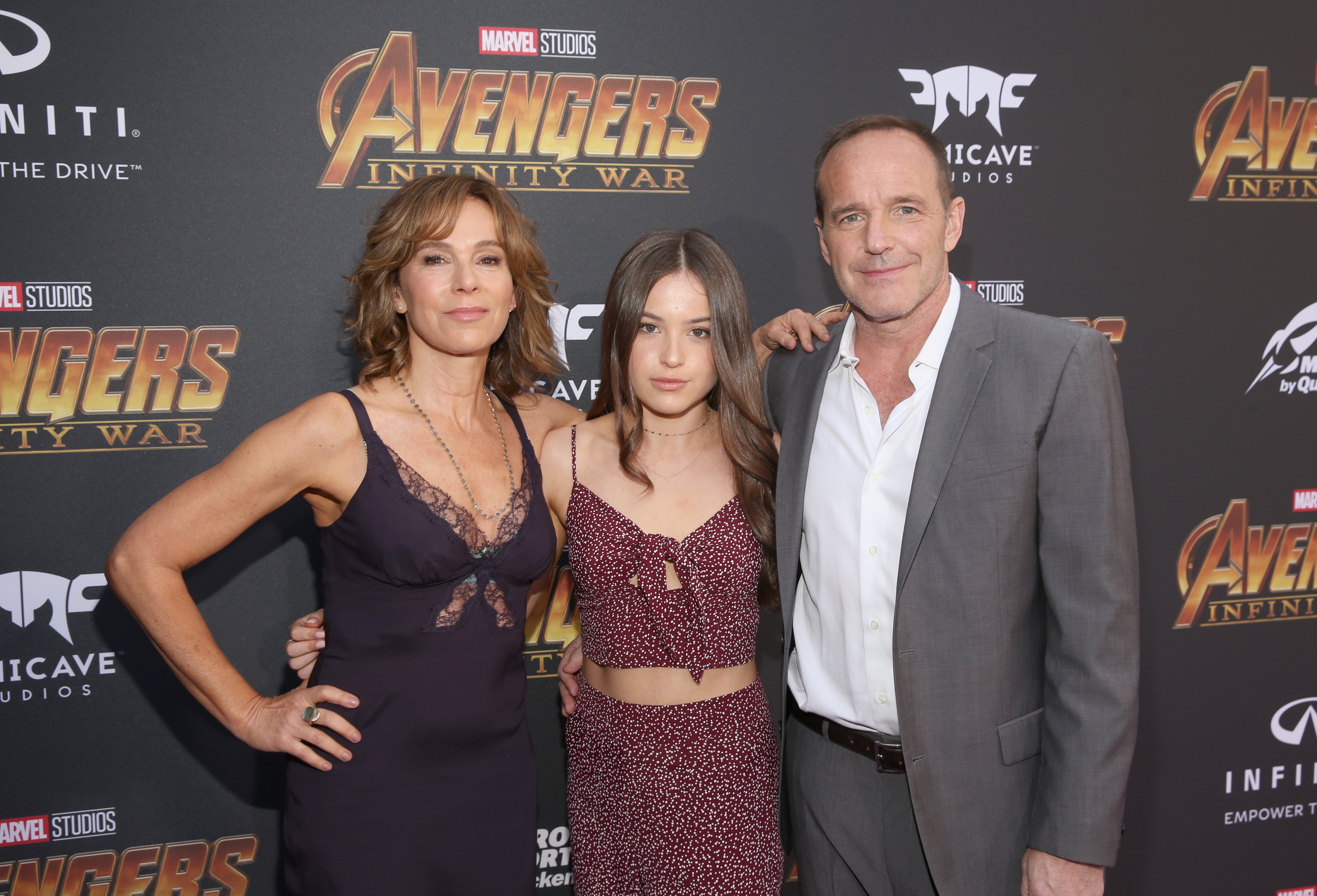 (L-R) Jennifer Grey, Stella Gregg, and Clark Gregg attend the premiere for "Avengers: Infinity War" on April 23, 2018, in Hollywood, California. | Source: Getty Images