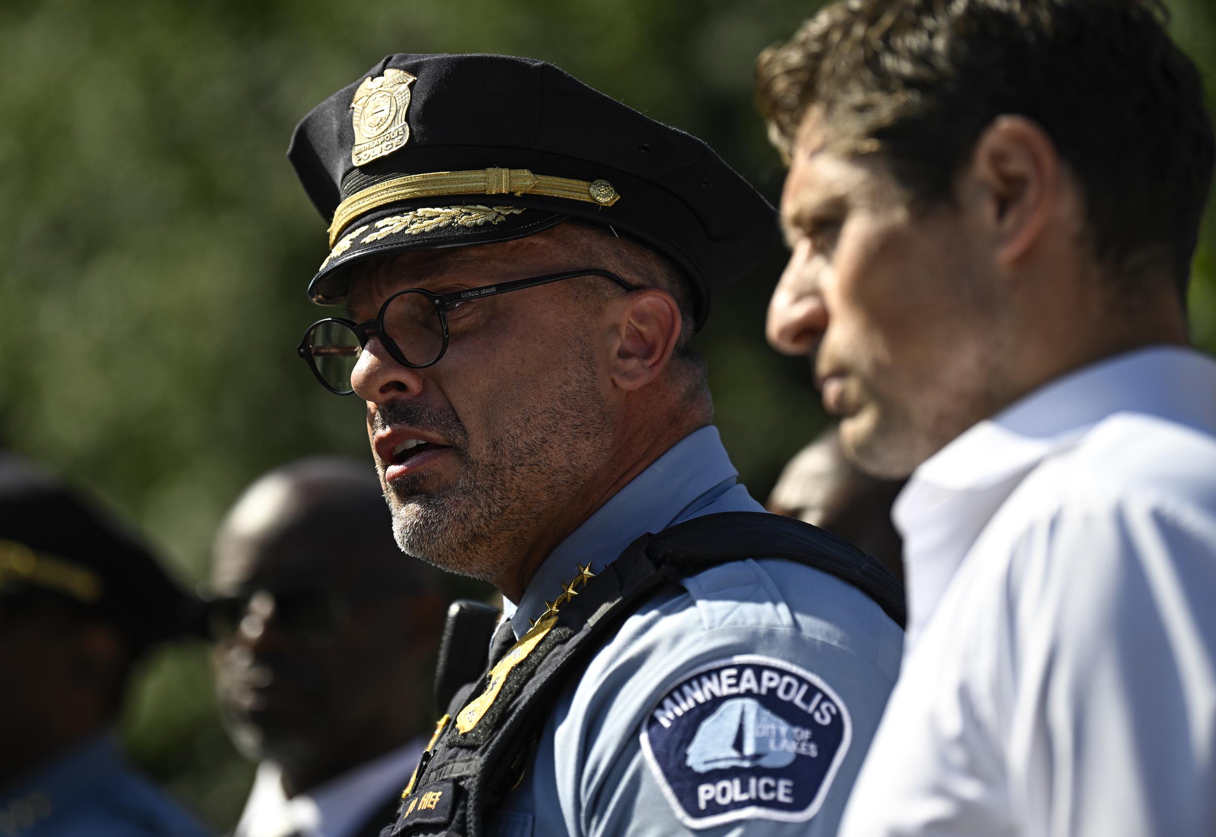Minneapolis Police Chief Brian O'Hara speaks during a press conference as Mayor Jacob Frey listens following the Annunciation Church shooting on August 27, 2025 | Source: Getty Images