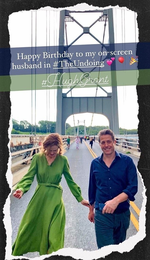 Nicole Kidman and Hugh Grant walking together on a bridge. | Photo: Instagram/@nicolekidman