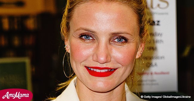 Cameron Diaz, 45, puts on a dazzling display as she flaunts her body in a plunging crimson gown