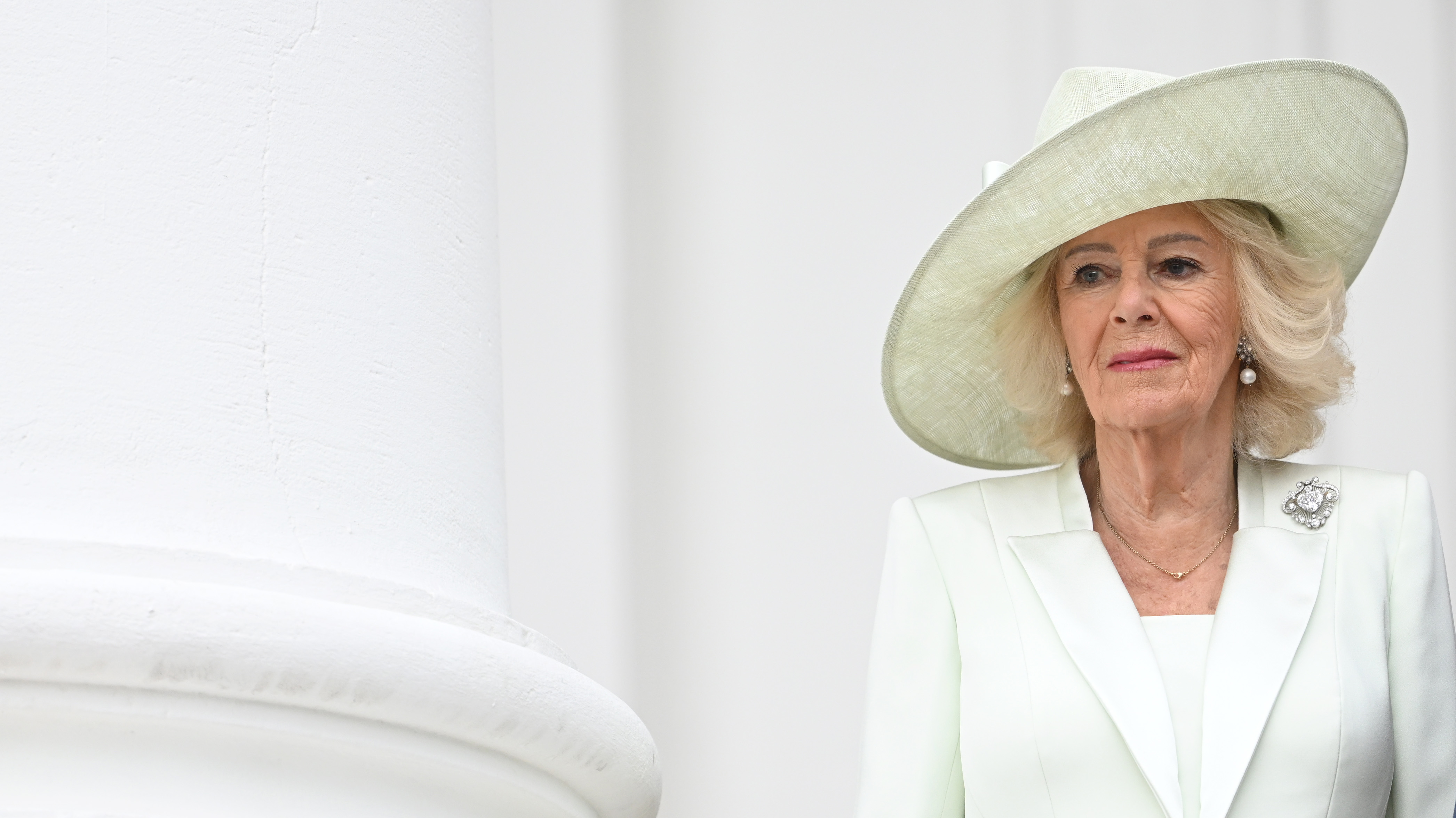 Queen Camilla looks on from the balcony of the White House during a state arrival ceremony on the South Lawn on day two of the State Visit of King Charles III and Queen Camilla to the United States of America on April 28, 2026, in Washington, DC | Source: Getty Images