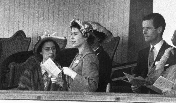 Princess Margaret, Queen Elizabeth II and Group Captain Peter Townsend on June 13, 1951 in the Royal Box at Ascot | Photo: Getty Images