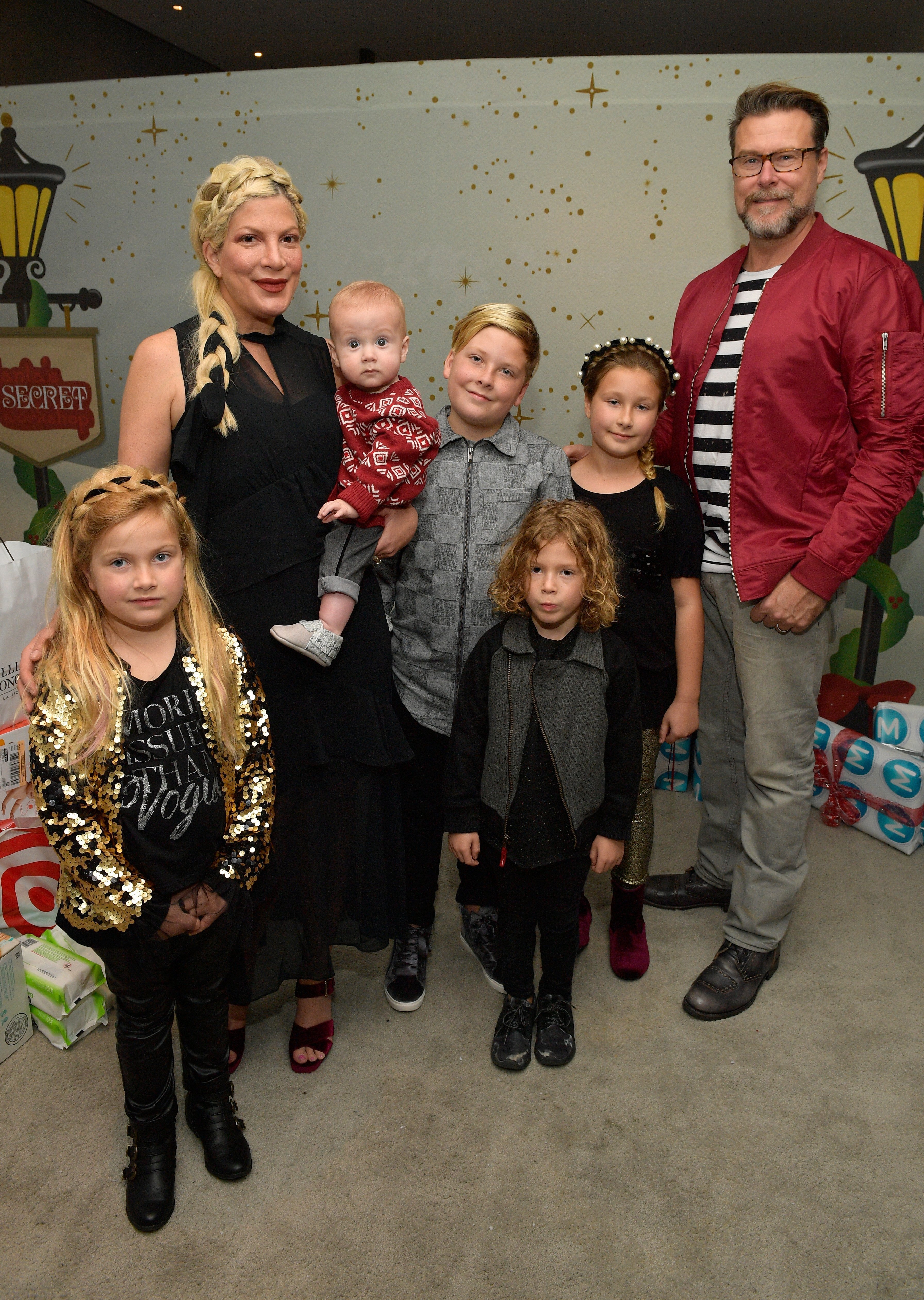 Tori Spelling, Dean McDermott, and their children at the 7th Annual Santa's Secret Workshop benefiting LA Family Housing. | Source: Getty Images