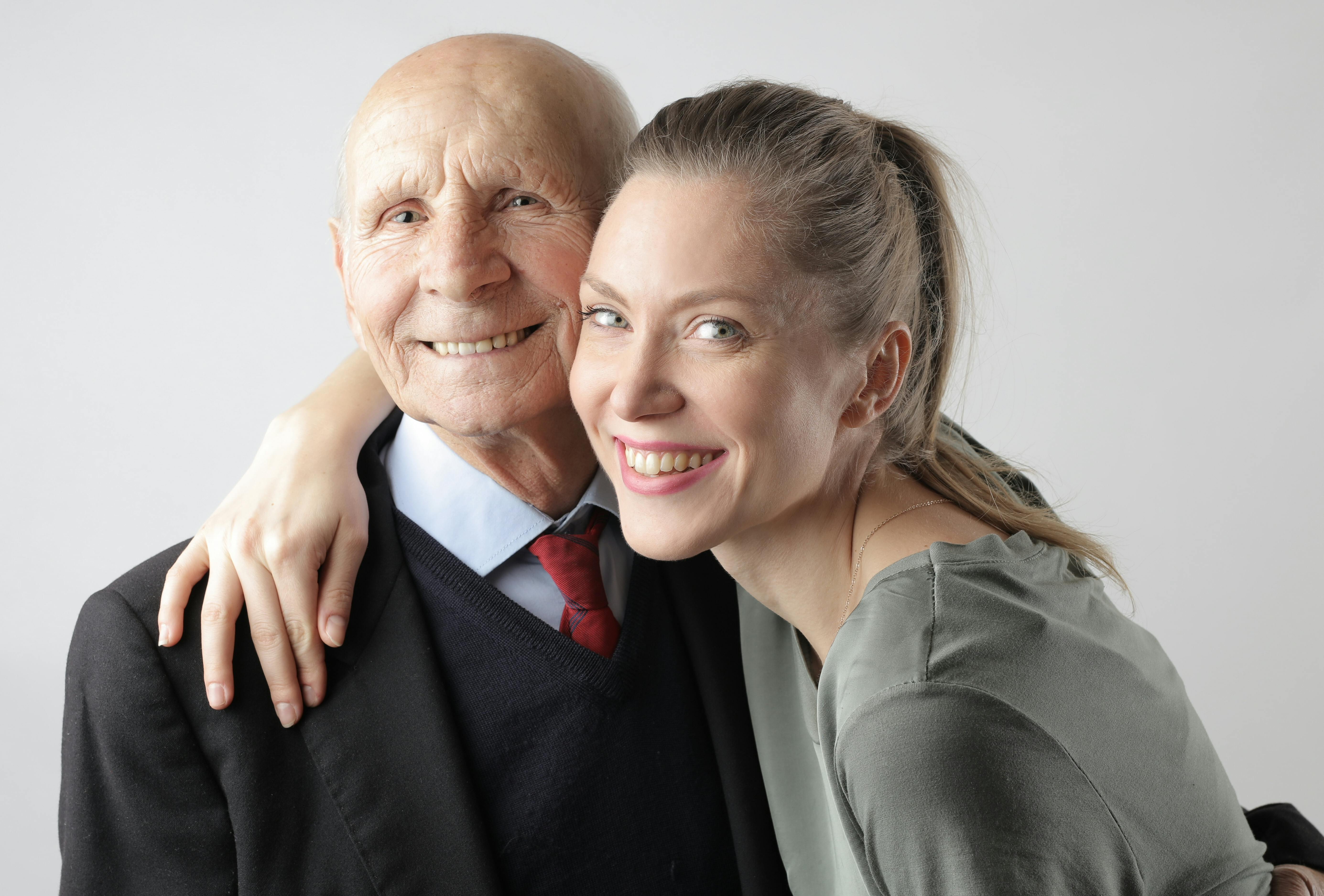 A father hugging his daughter | Source: Pexels