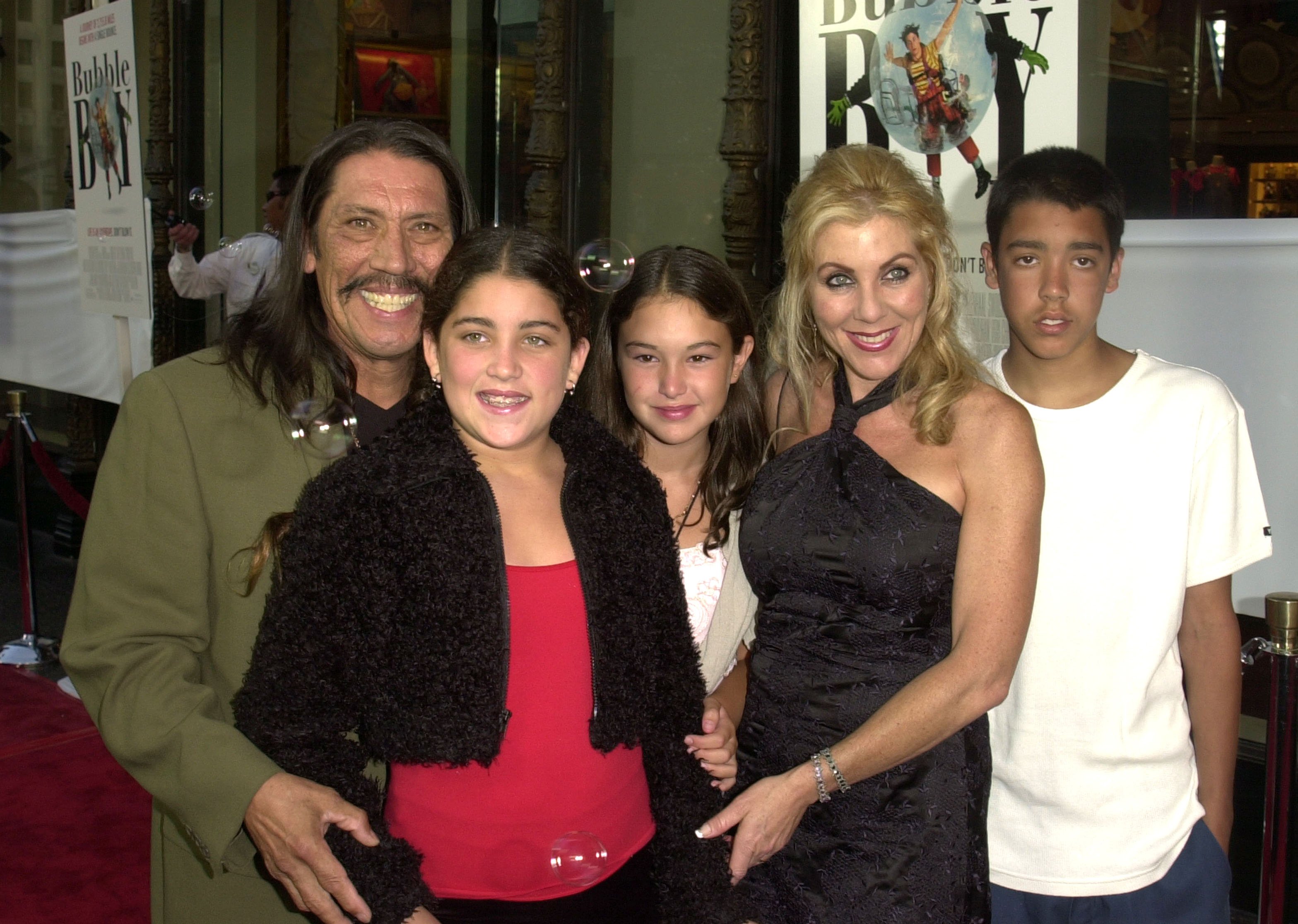 Danny Trejo, and his wife Debbie, together with their children Rebecca, Danielle, and Gilbert, attend the "Bubble Boy" premiere on August 23, 2001, in Hollywood, California. | Source: Getty Images
