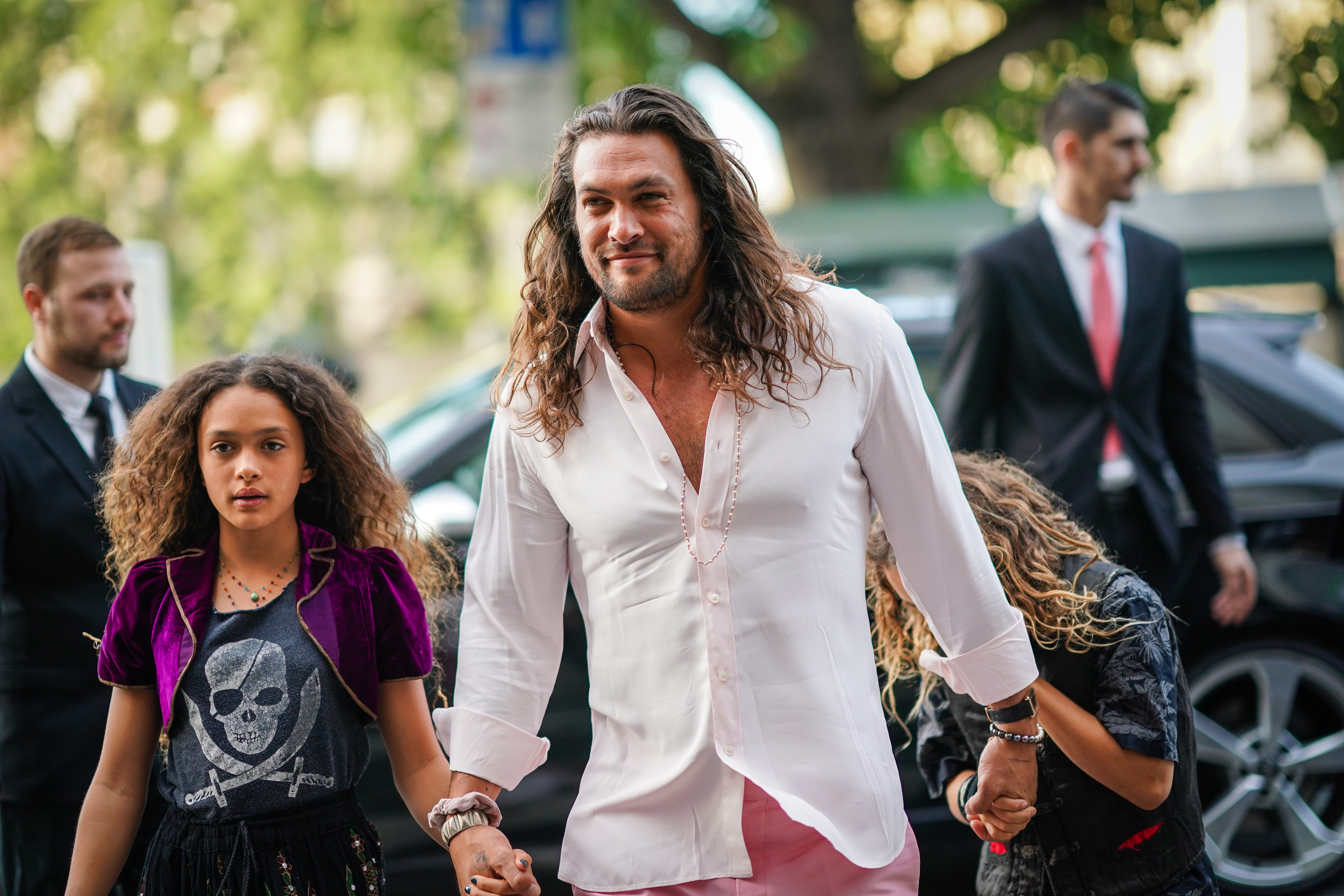 Jason, Lola Iolani, and Nakoa-Wolf Momoa at Laperouse restaurant for a pre-wedding dinner for Zoe Kravitz and Karl Glusma on June 28, 2019, in Paris, France | Source: Getty Images