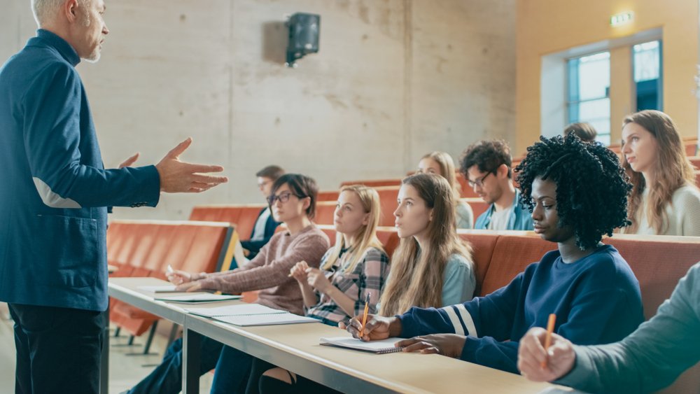 A professor holding lecture in a university. | Photo: Shutterstock
