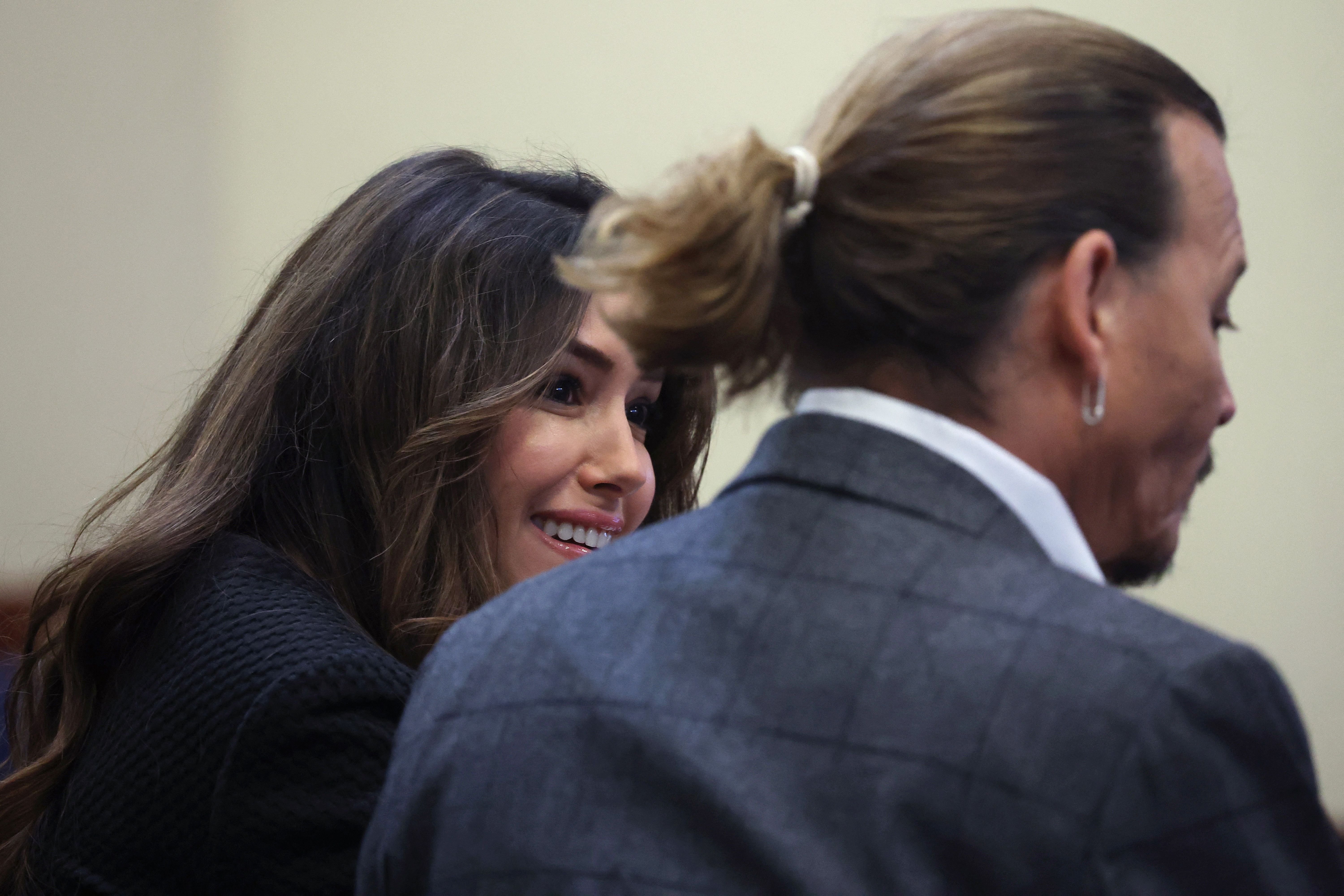 Johnny Depp and attorney Camille Vasquez during the Depp vs Heard defamation trial at the Fairfax County Circuit Court in Fairfax, Virginia, on April 28, 2022. | Source: Getty Images