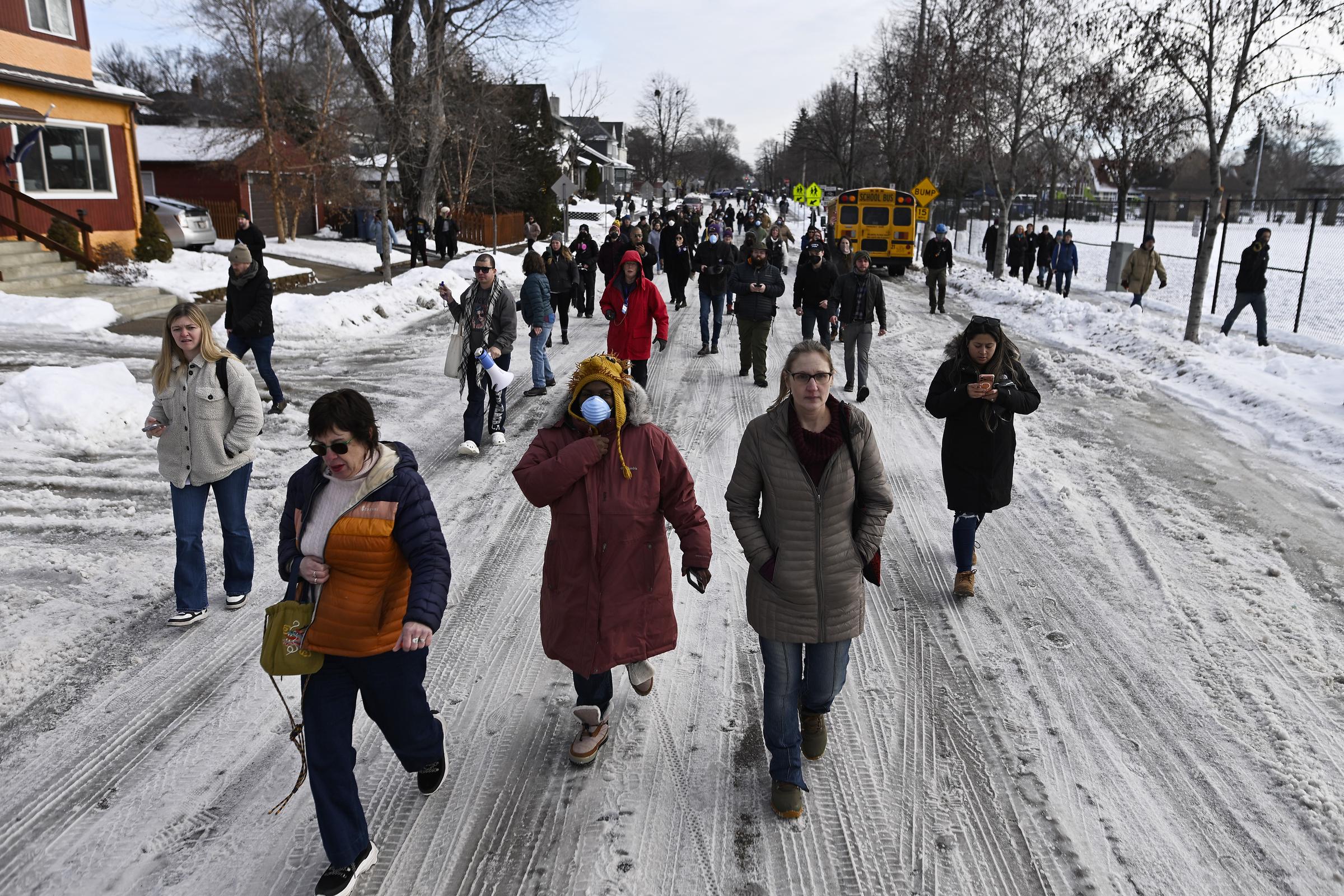 People gather on the street of Minneapolis during ICE operation that ended the life of Renee Nicole Good. | Source: Getty Images
