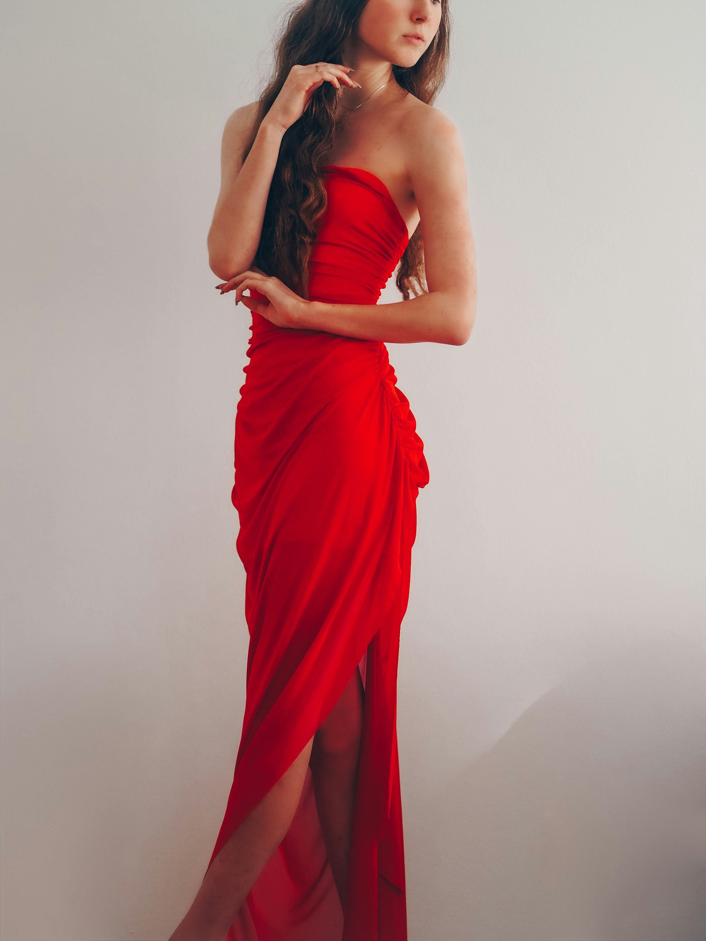 A girl in a red dress | Source: Unsplash