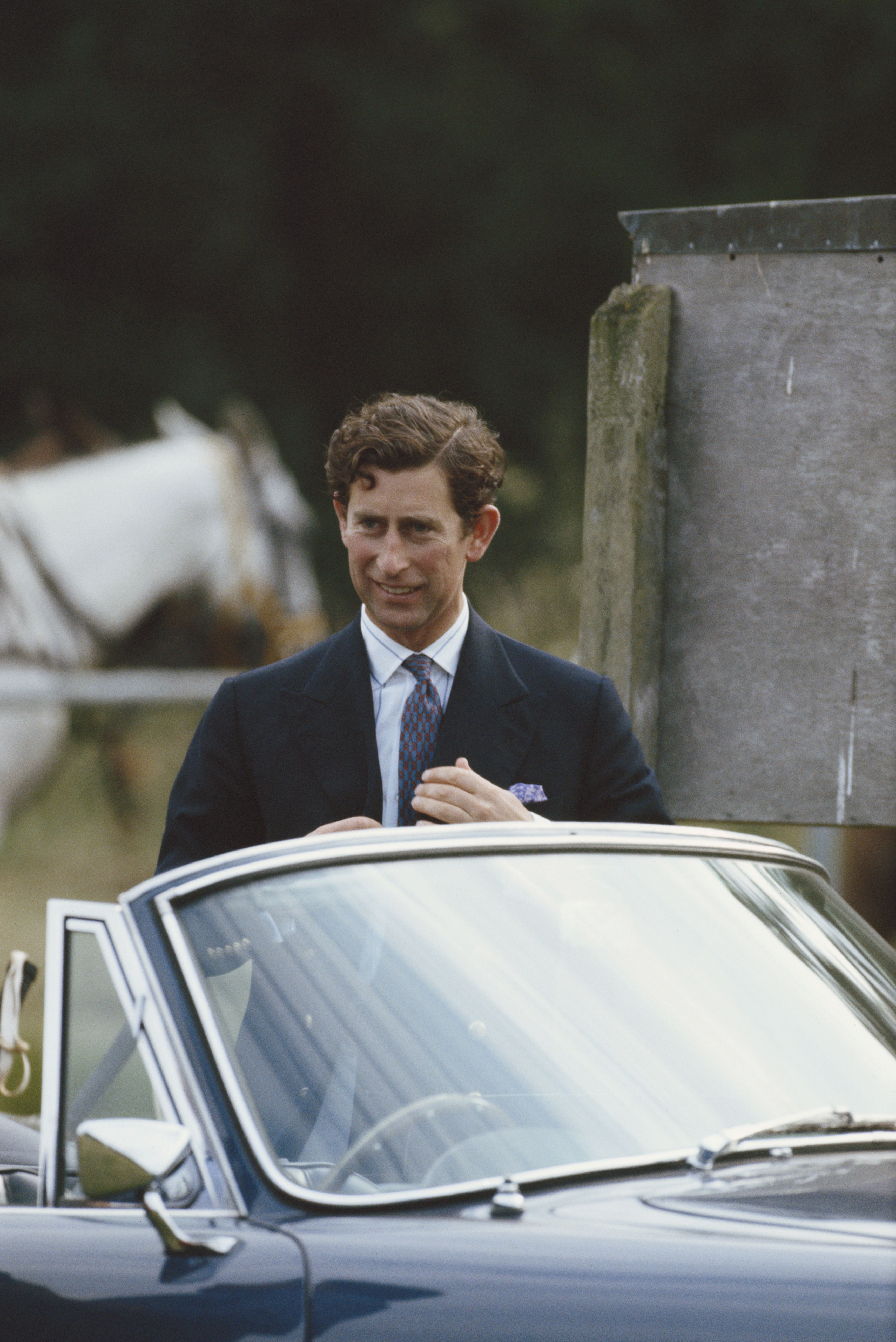 Prince Charles with his Aston Martin convertible, circa 1982. | Source: Georges De Keerle/Getty Images