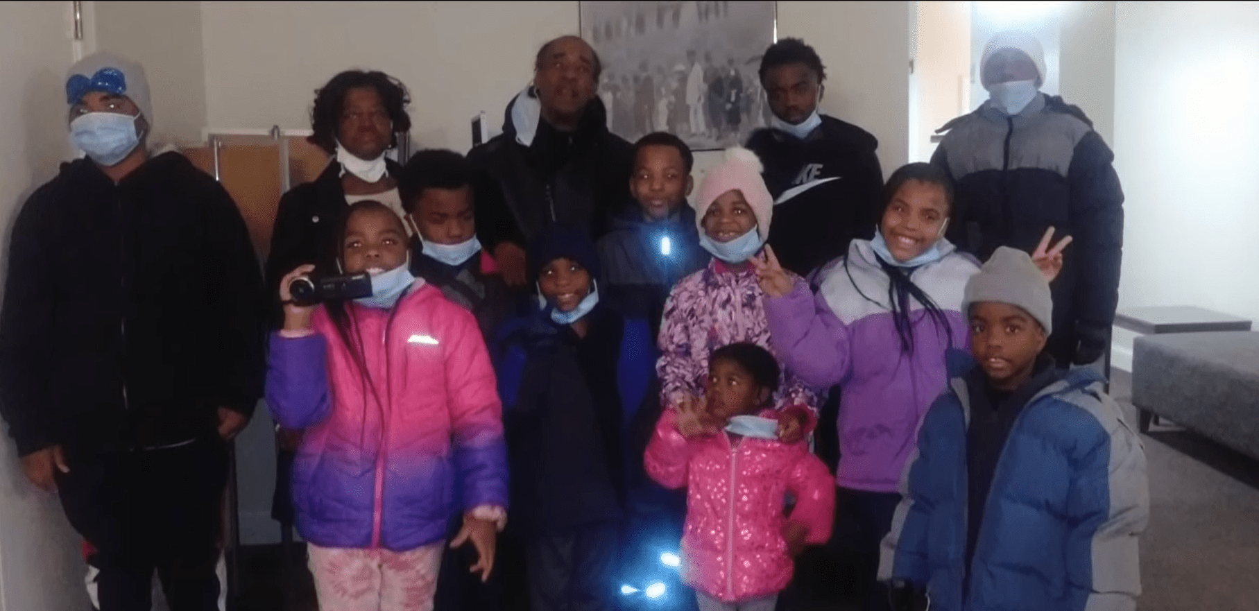 James Harris, his children and few church members in a group photo. | Source: youtube.com/News 5 Cleveland