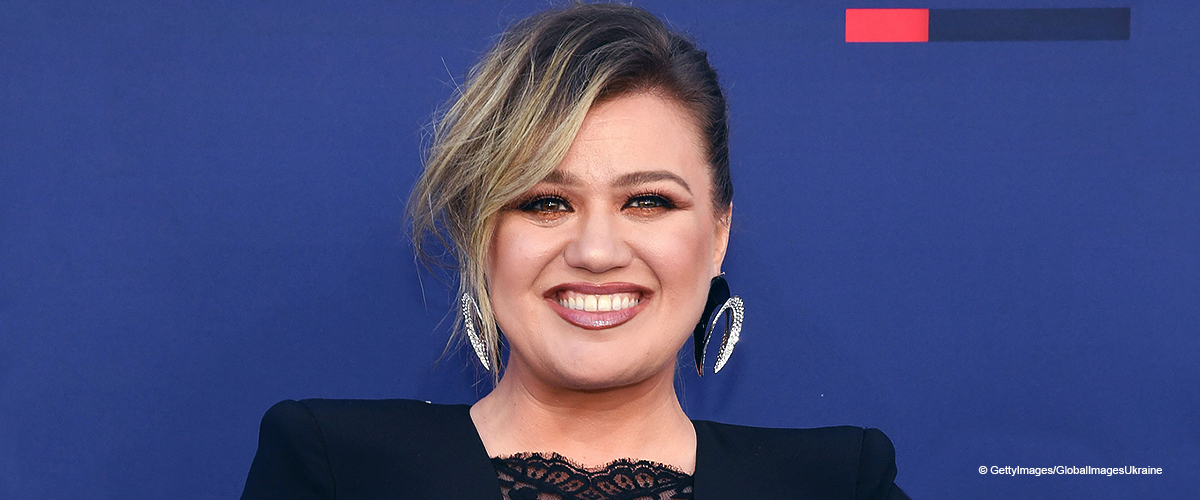 Kelly Clarkson Steals the Show in a Curve-Hugging Dress with a Plunging Sheer Cleavage