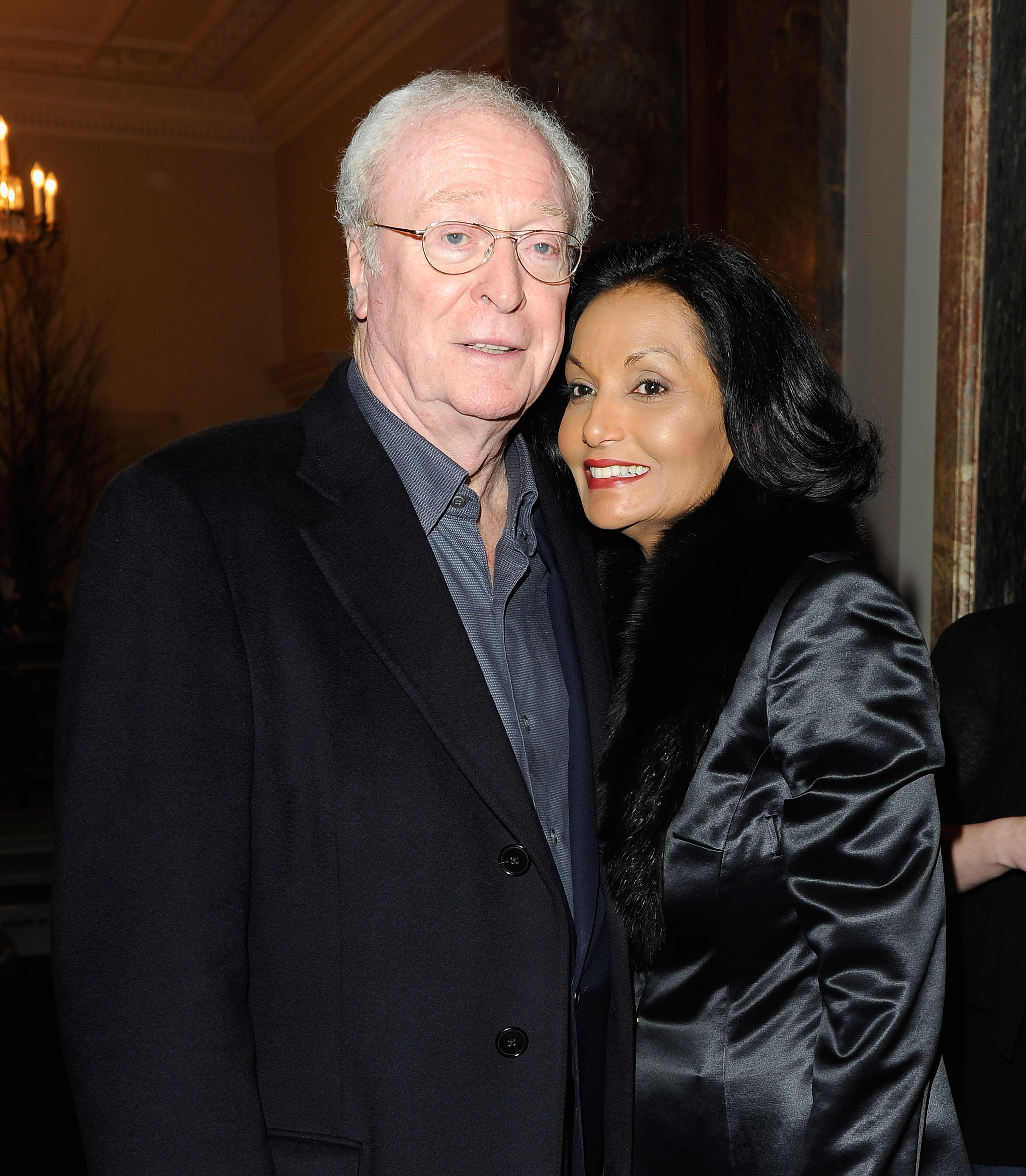 Michael Caine and Shakira Caine  at The David Hockney Private View at The Royal Academy of Arts on January 17, 2012 in London, England | Source: Getty Images