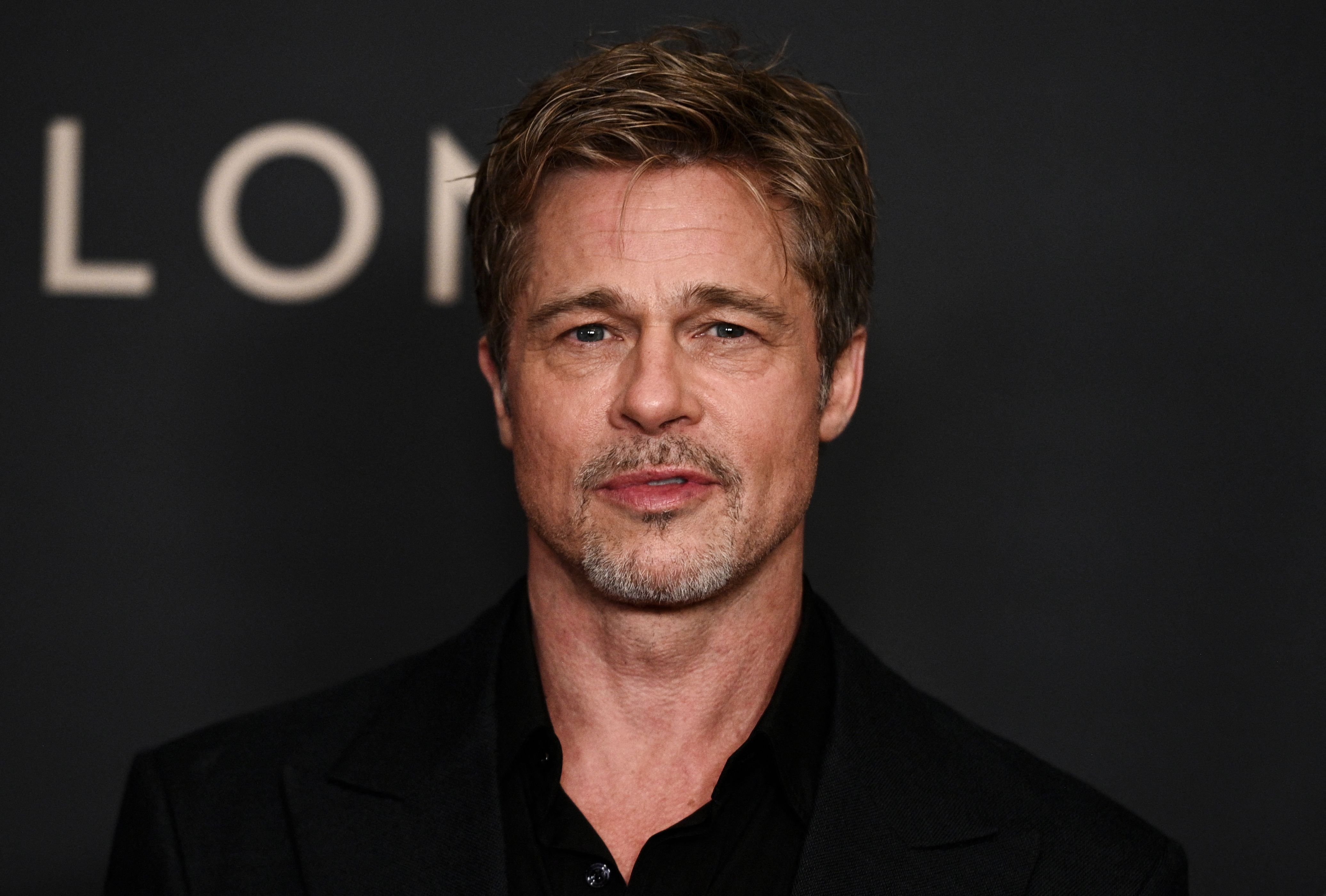 Brad Pitt poses ahead of the French premiere of "Babylon" at le Grand Rex in Paris on January 14, 2023. | Source: Getty Images
